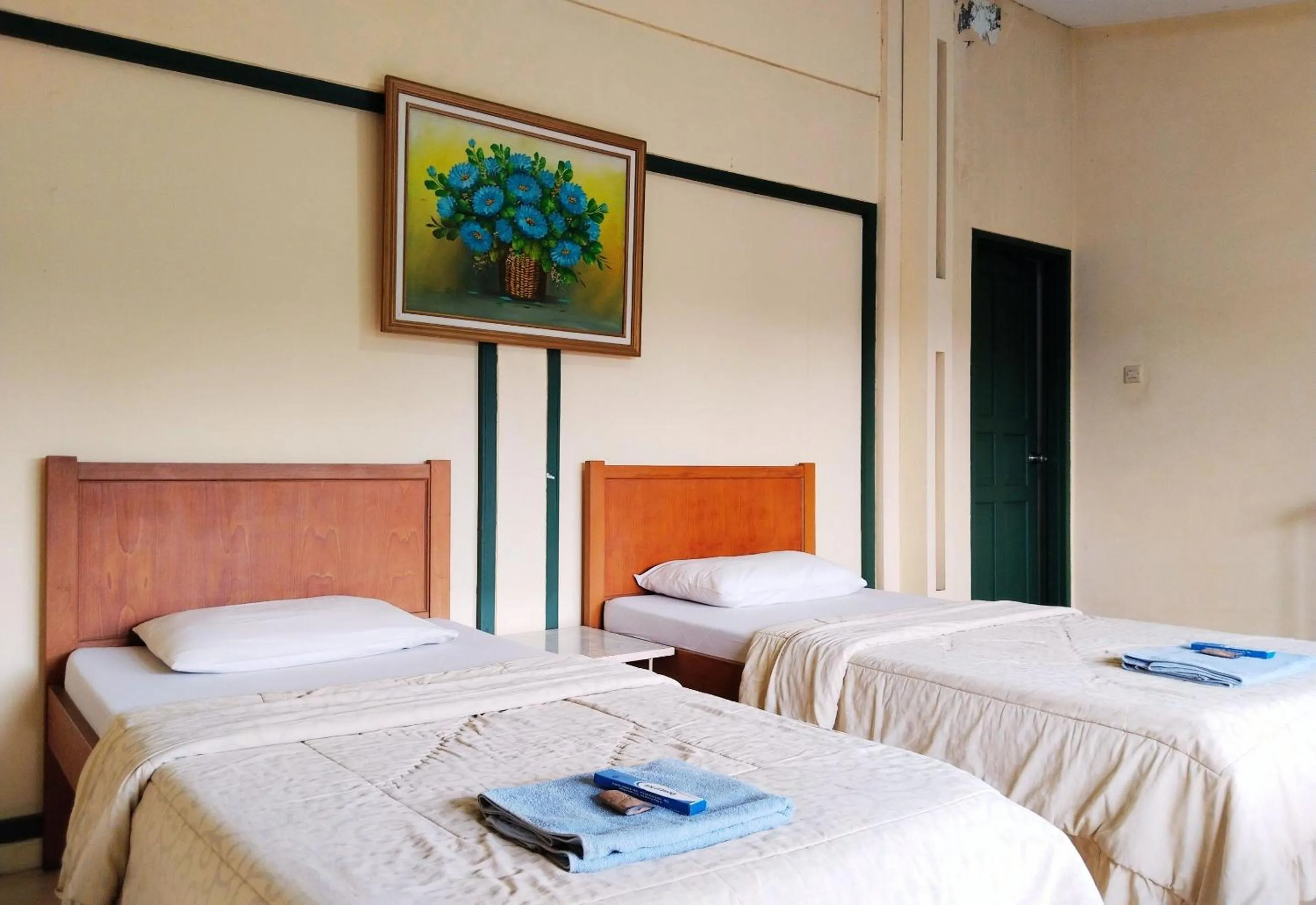 Bed in Hotel Grand Astoeti