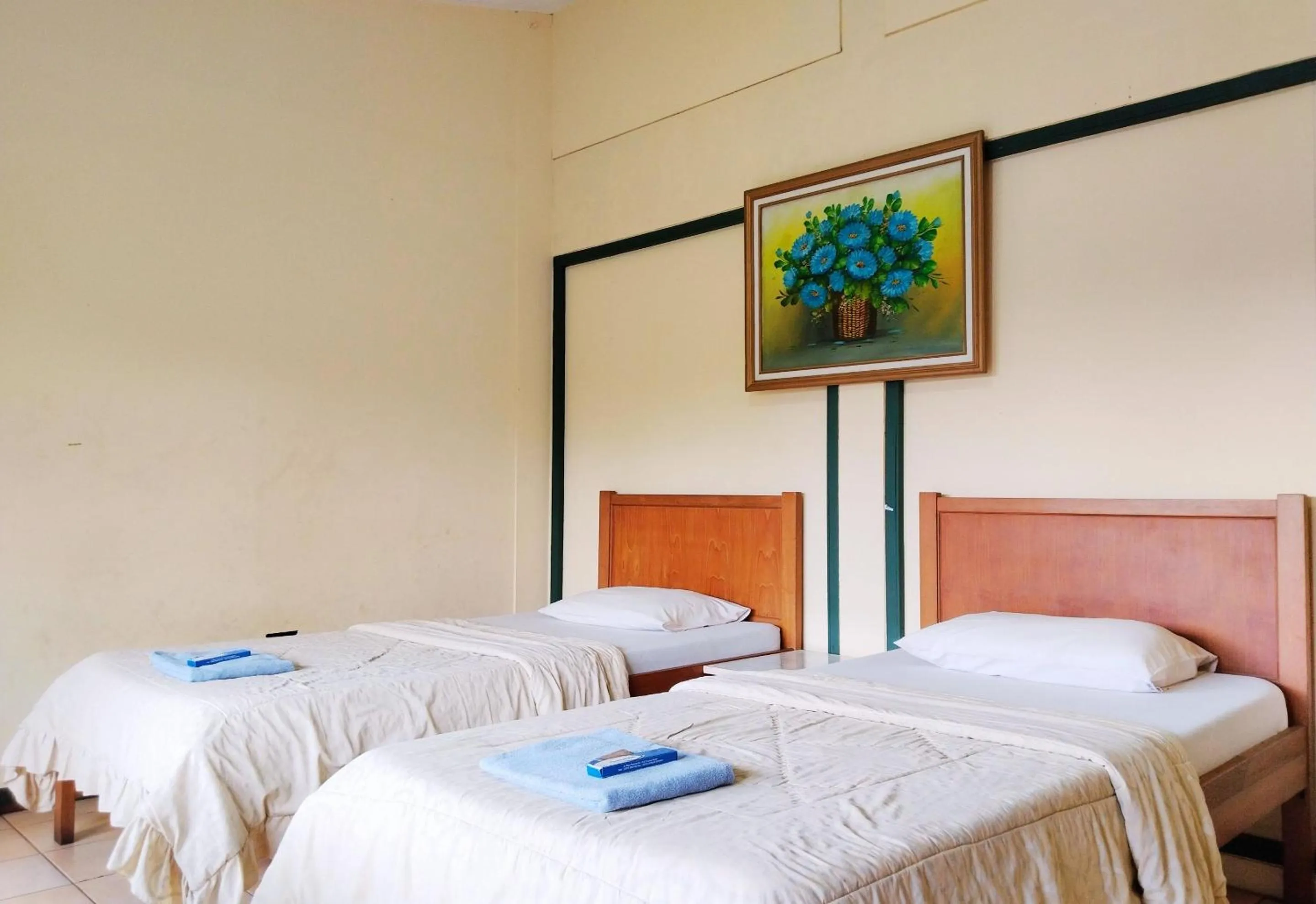 Bed in Hotel Grand Astoeti