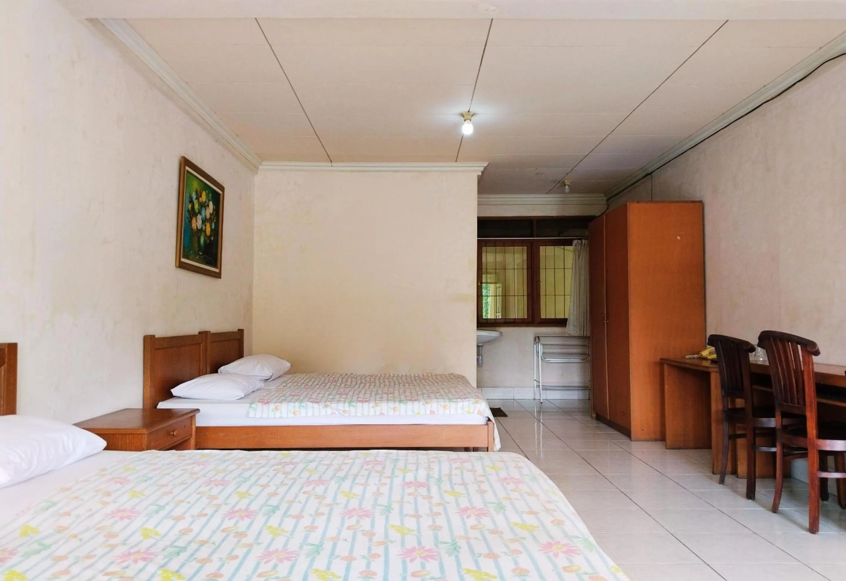 Bed in Hotel Grand Astoeti