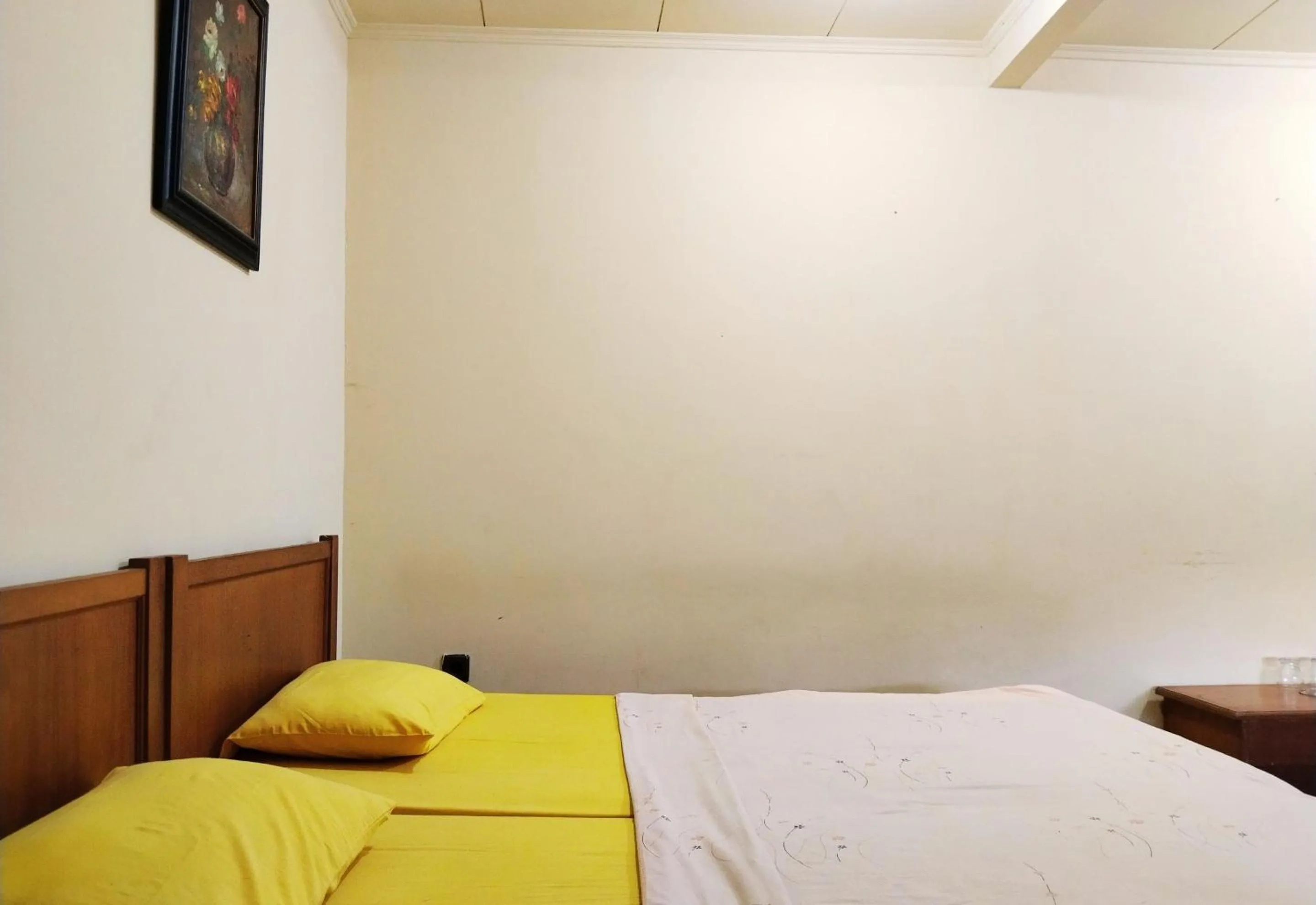 Bed in Hotel Grand Astoeti