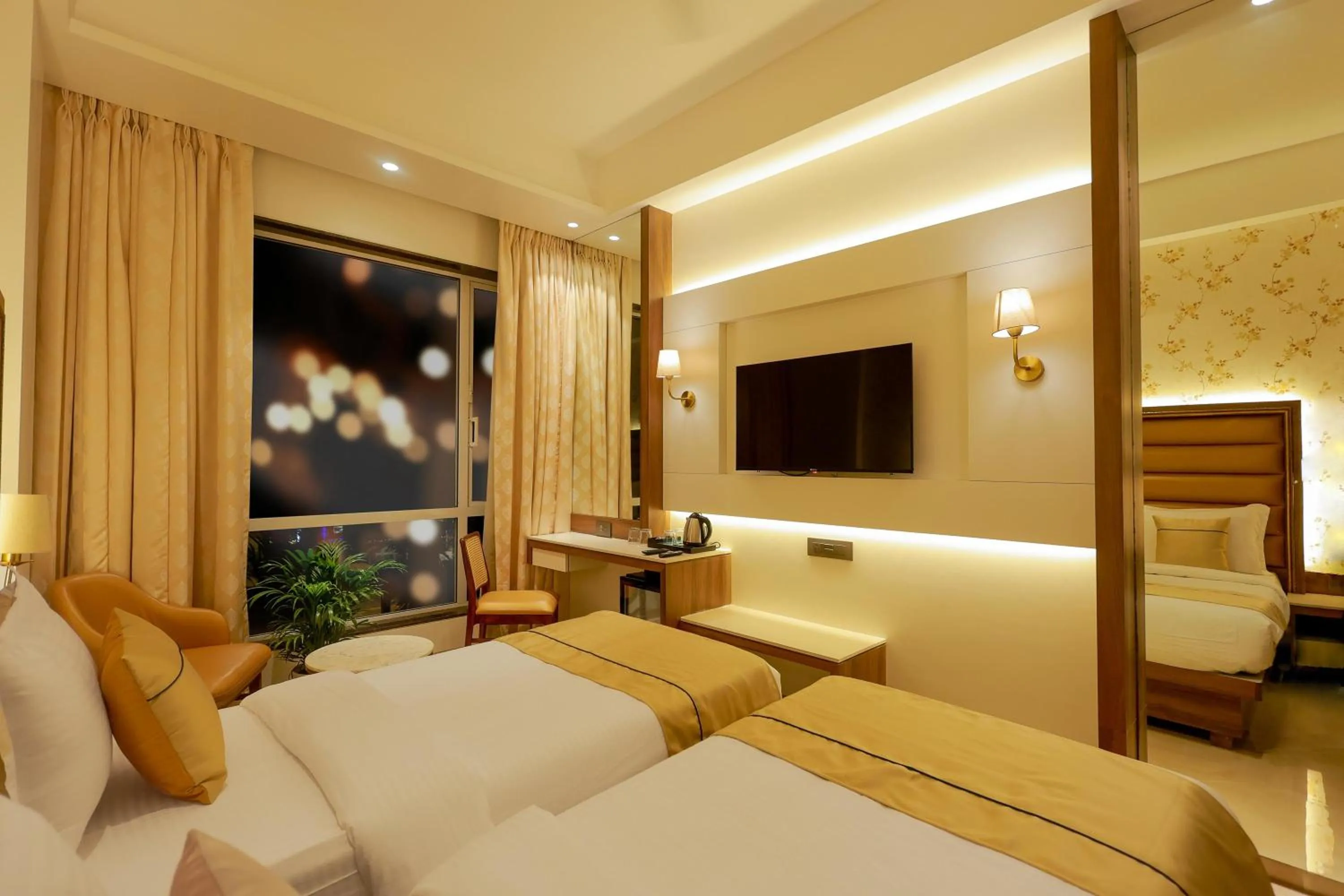 Bed in Shera Hotels & Banquets