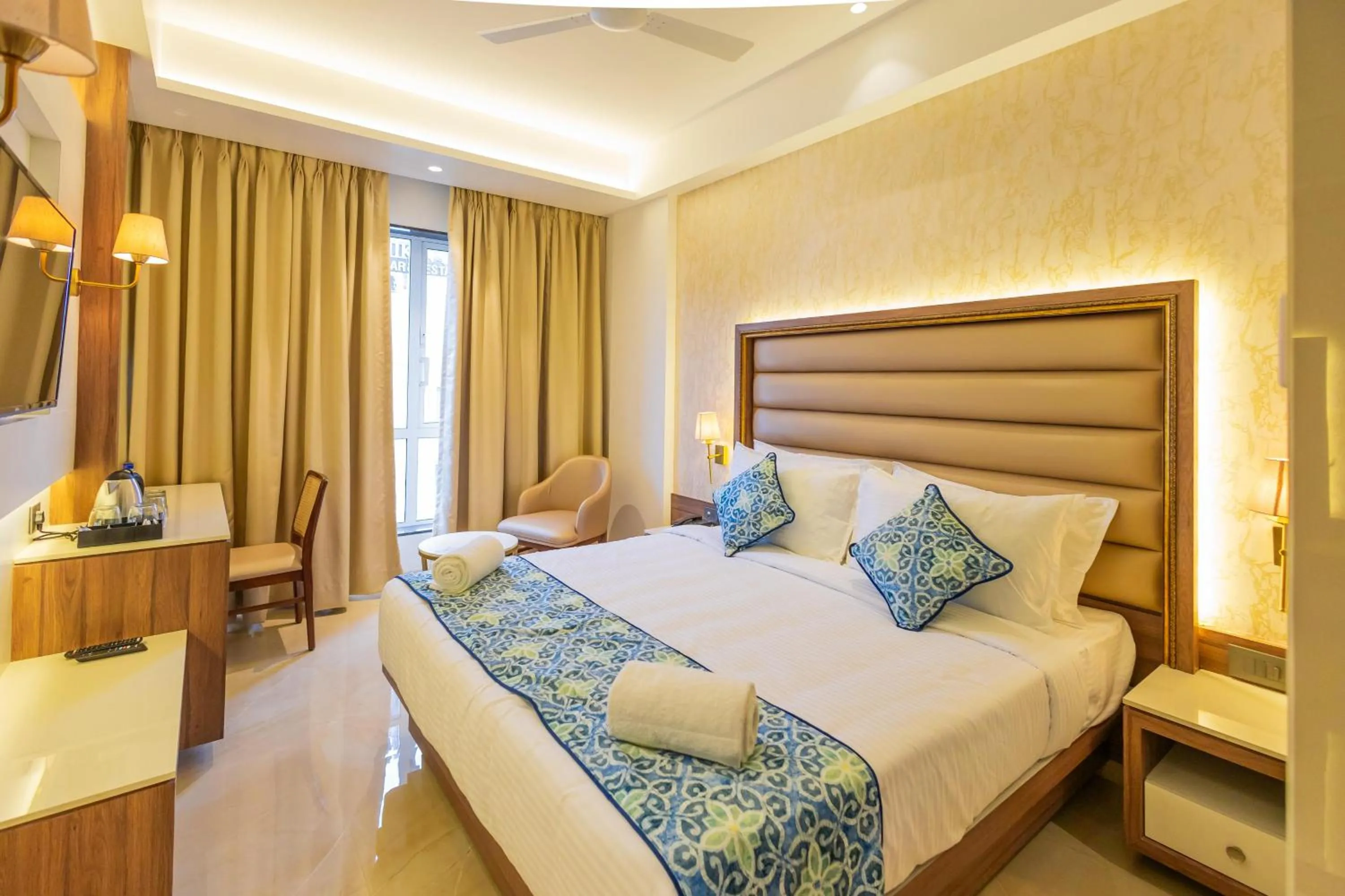 Bed in Shera Hotels & Banquets