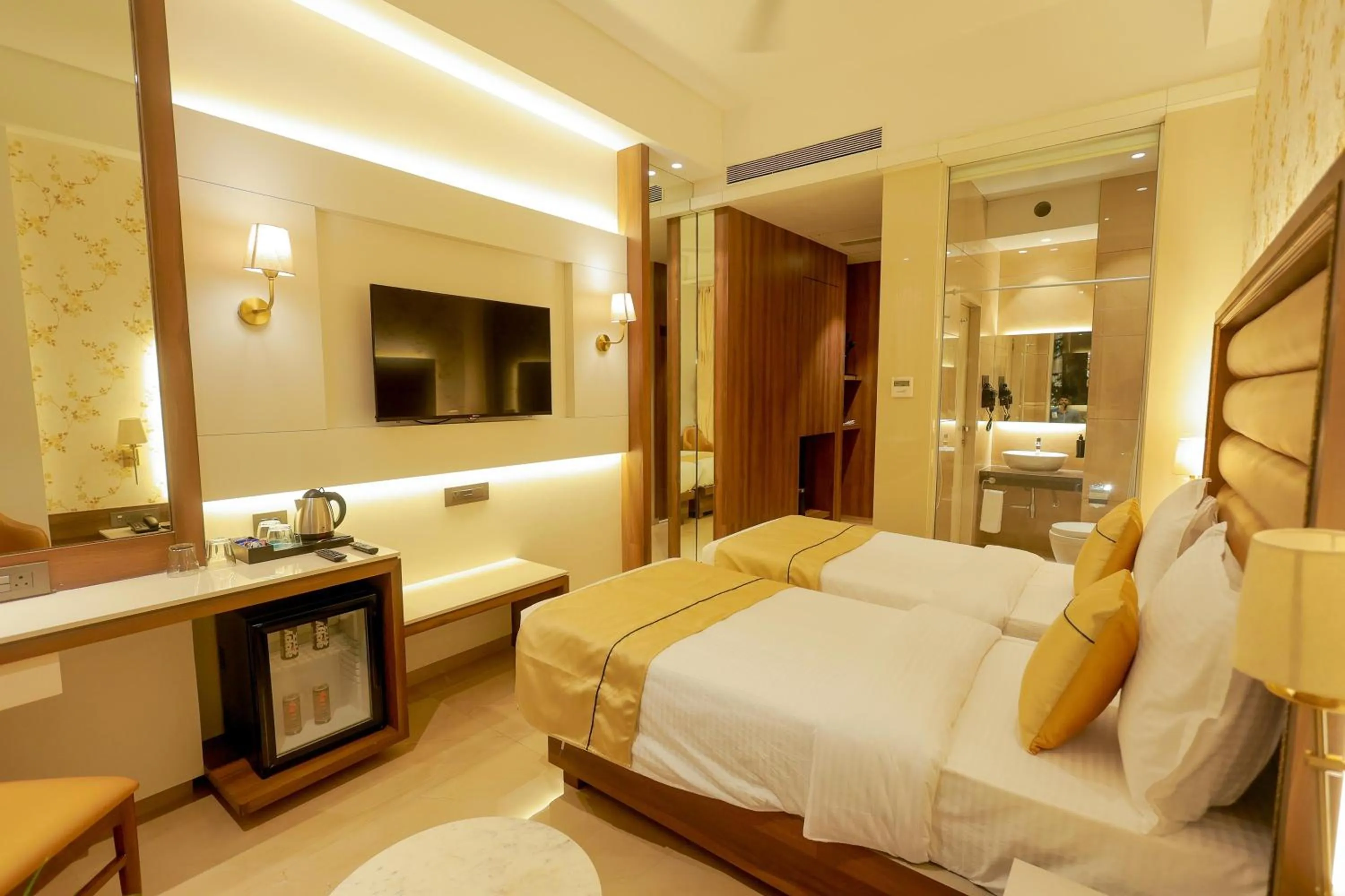 Bed in Shera Hotels & Banquets