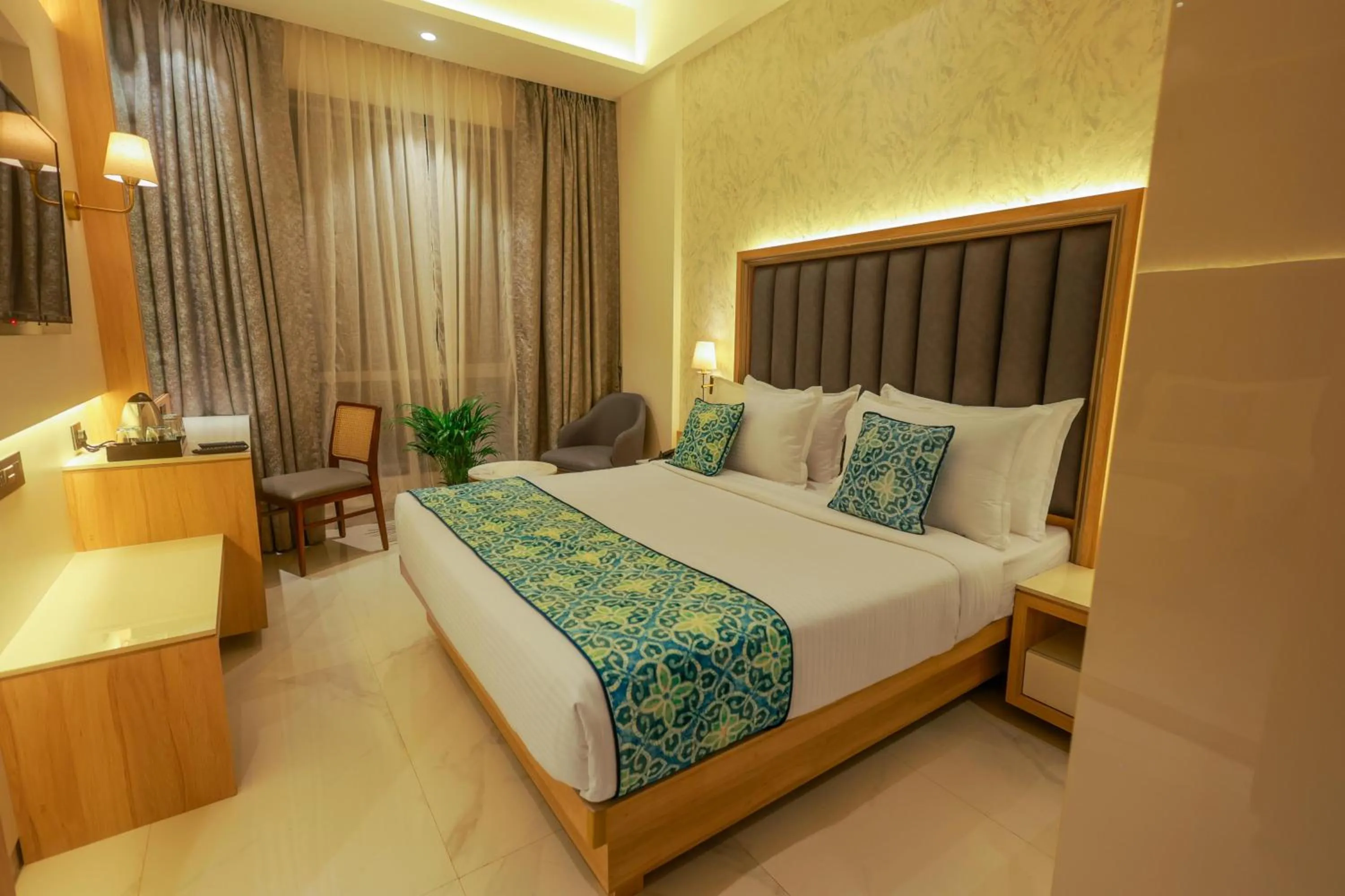 Bed in Shera Hotels & Banquets