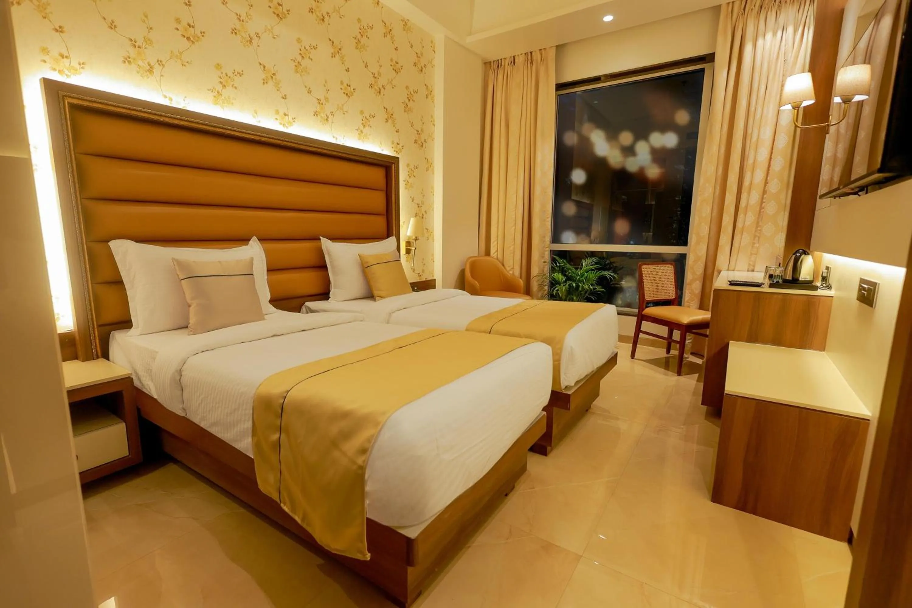 Bed in Shera Hotels & Banquets