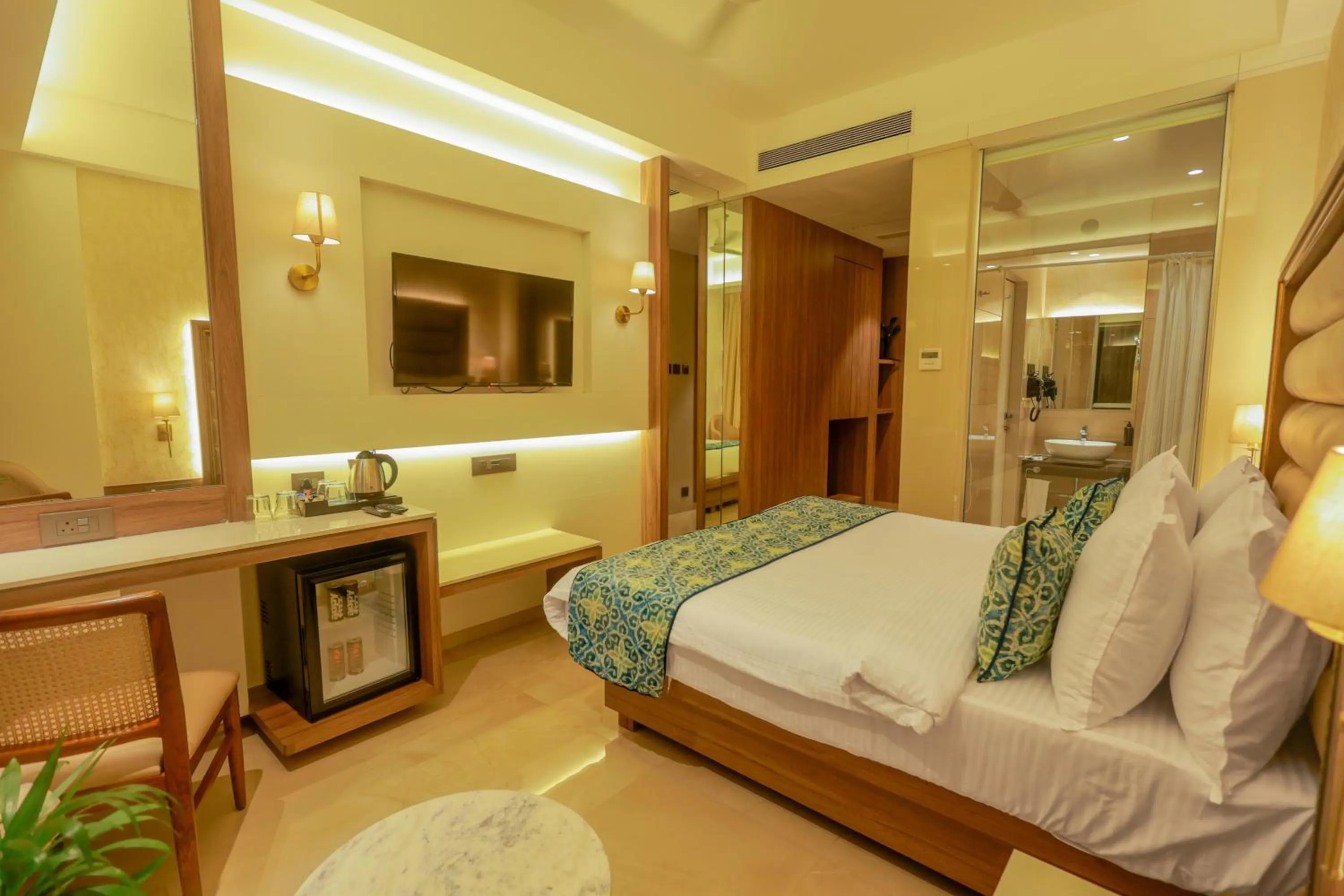 Bed in Shera Hotels & Banquets