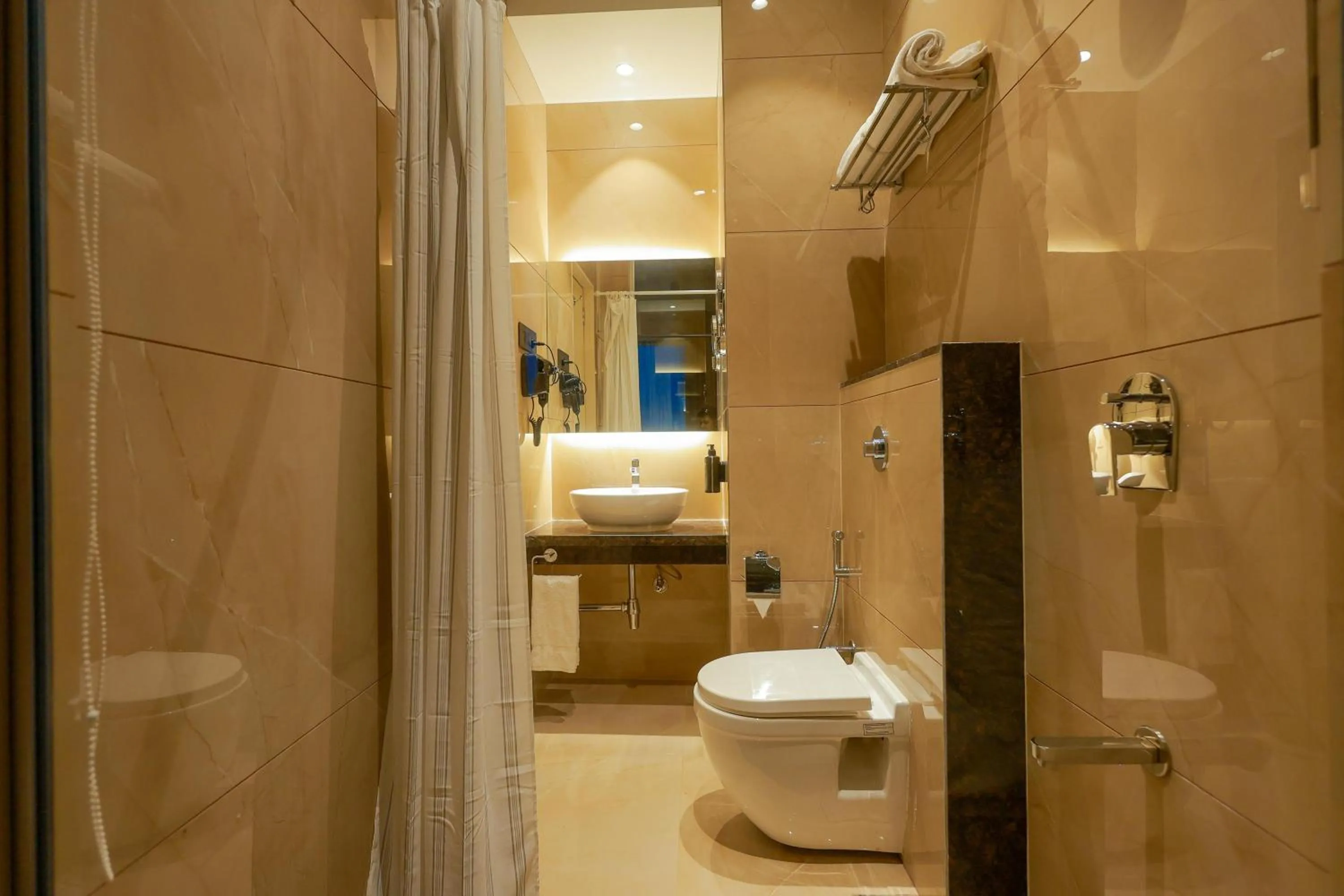 Bathroom in Shera Hotels & Banquets