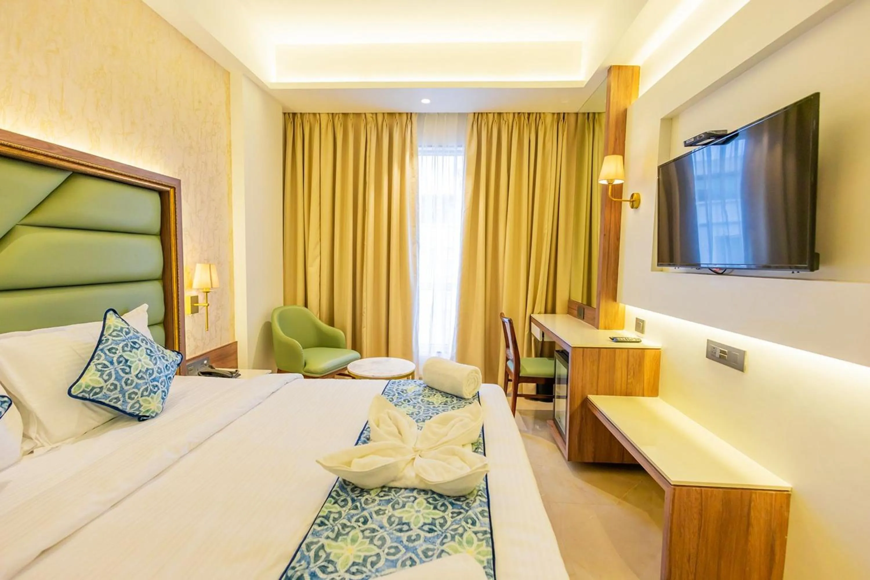 Bed in Shera Hotels & Banquets