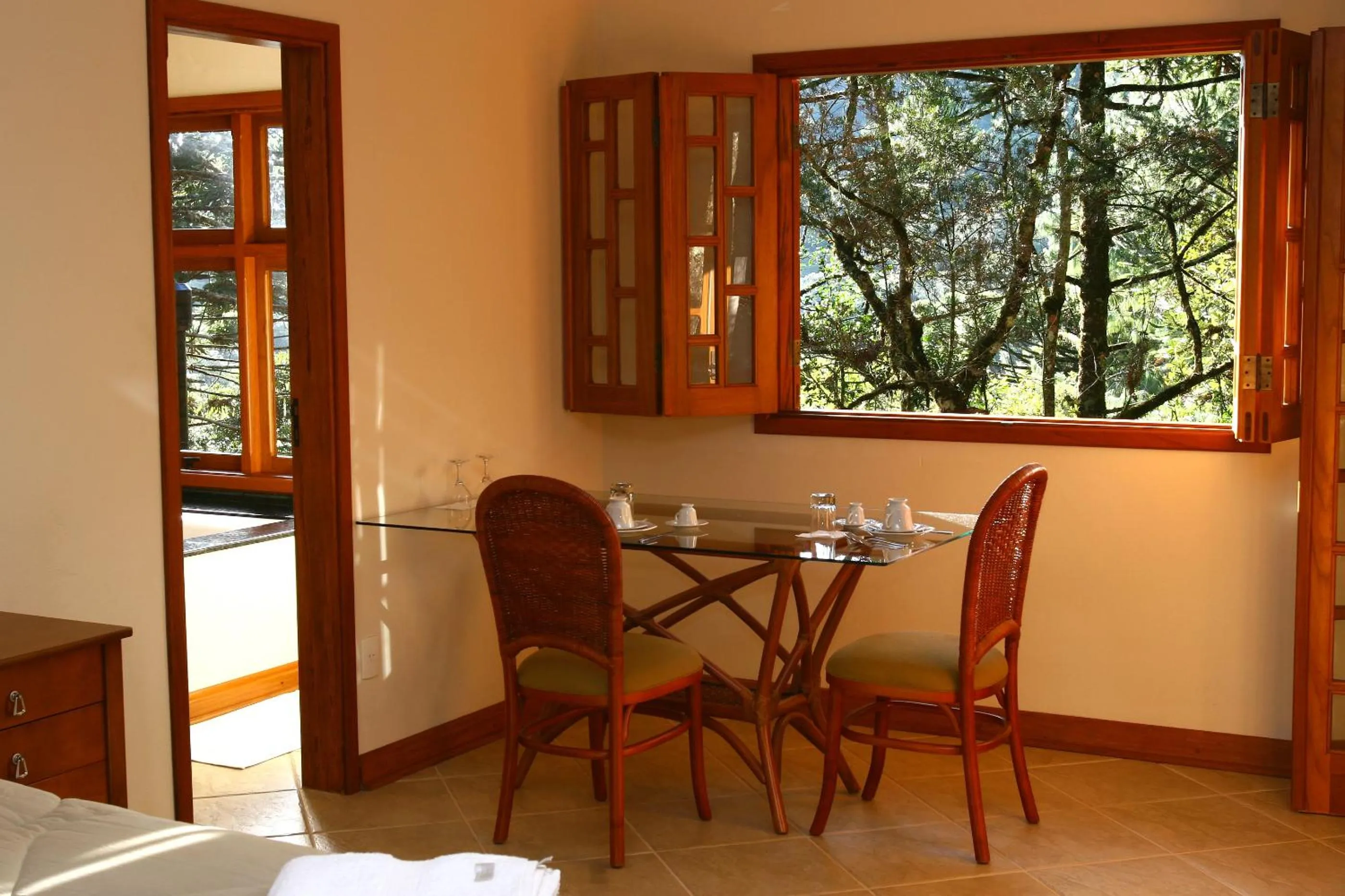 Dining area in Pousada Chalé da Floresta
