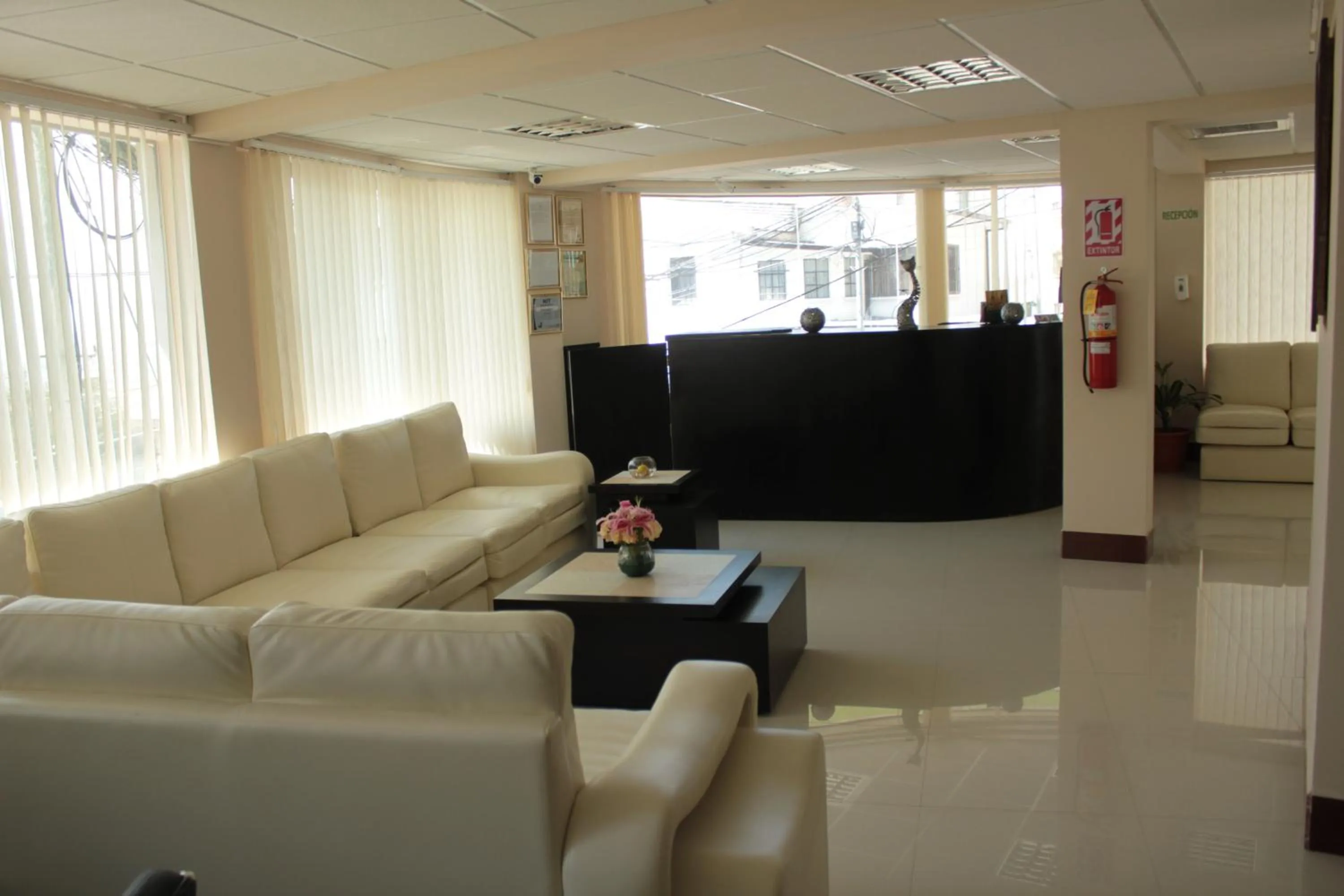 Communal lounge/ TV room in Almudena Apart Hotel