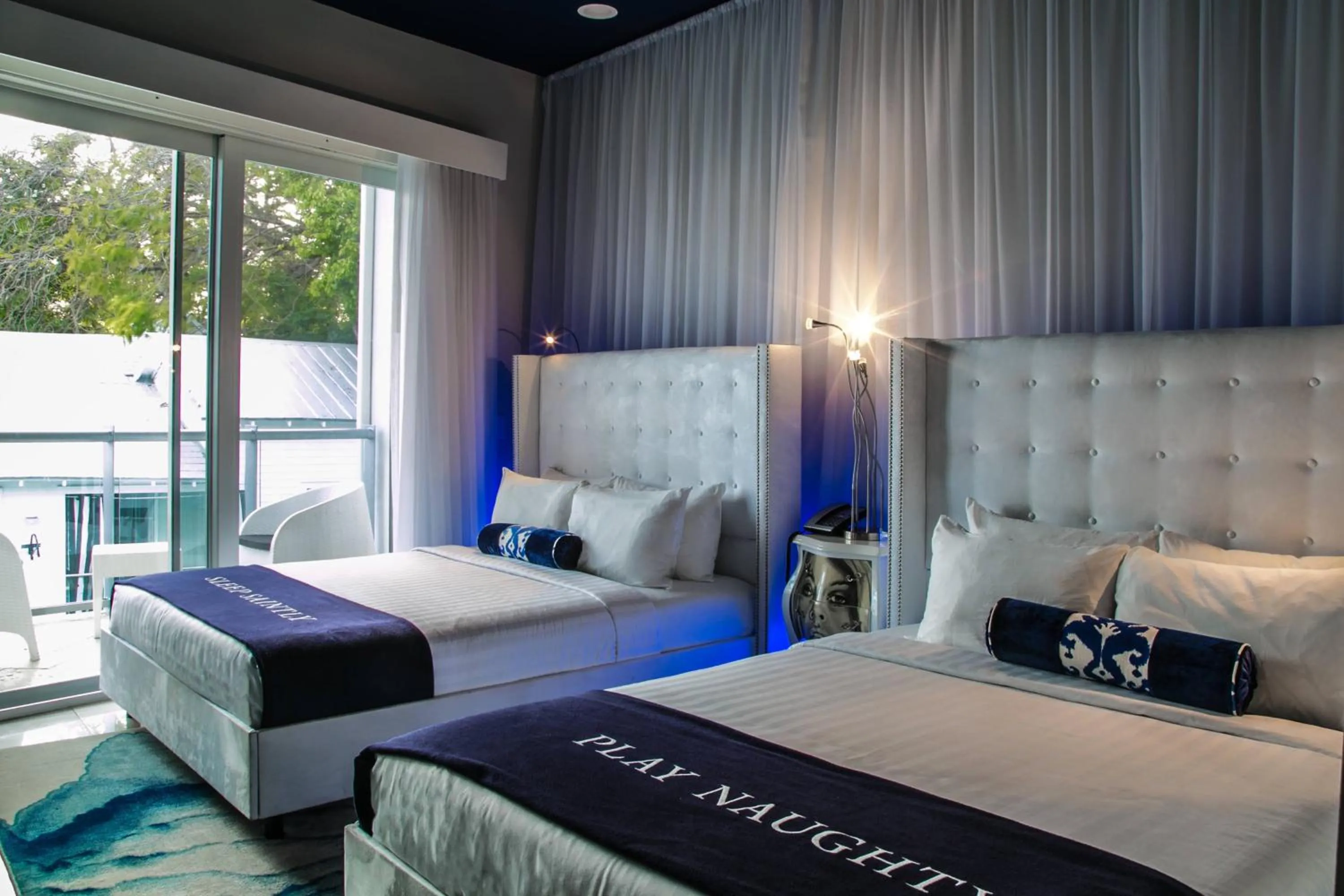 Photo of the whole room, Bed in The Saint Hotel Key West, Autograph Collection, Adult Only