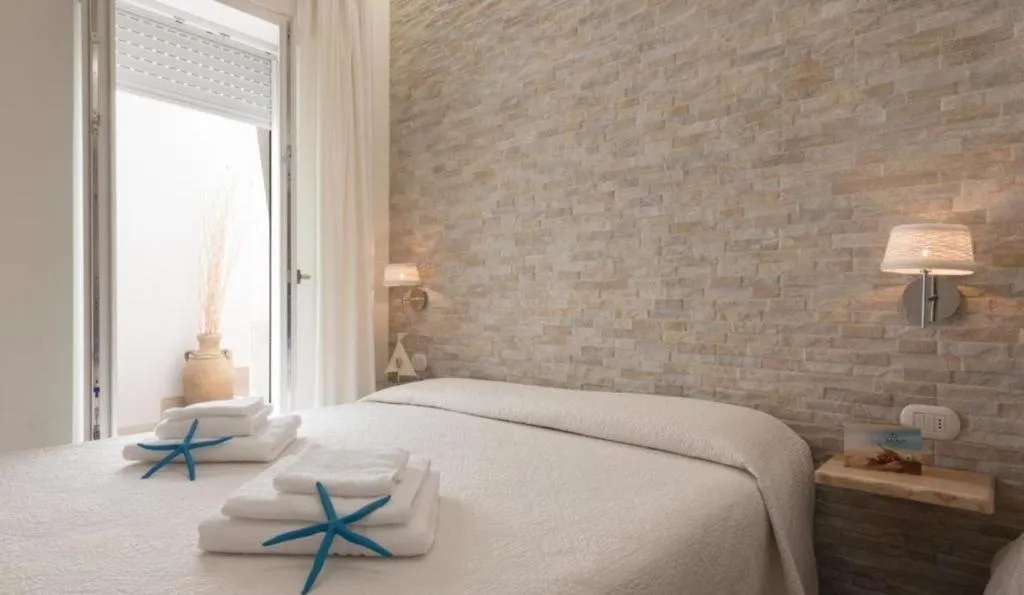 Bed in Le Gemelle Boutique Hotel