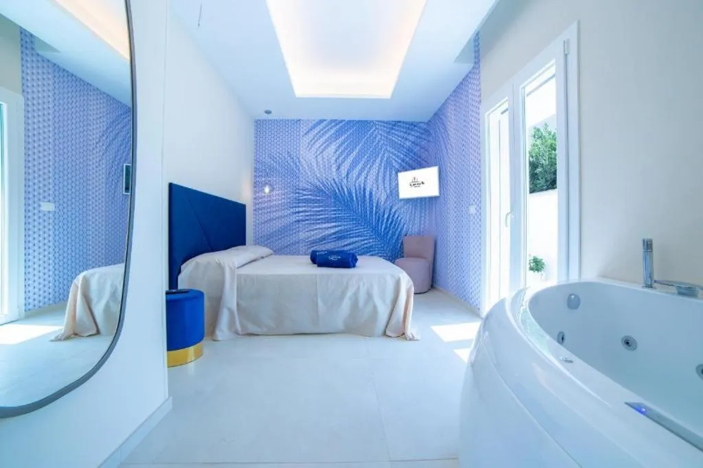 Bed in Le Gemelle Boutique Hotel