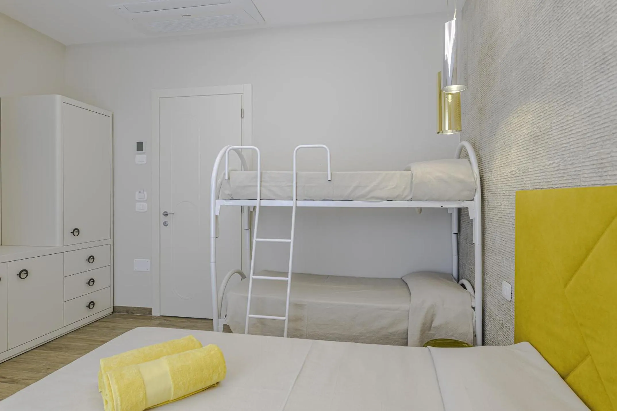 Bedroom in Le Gemelle Boutique Hotel