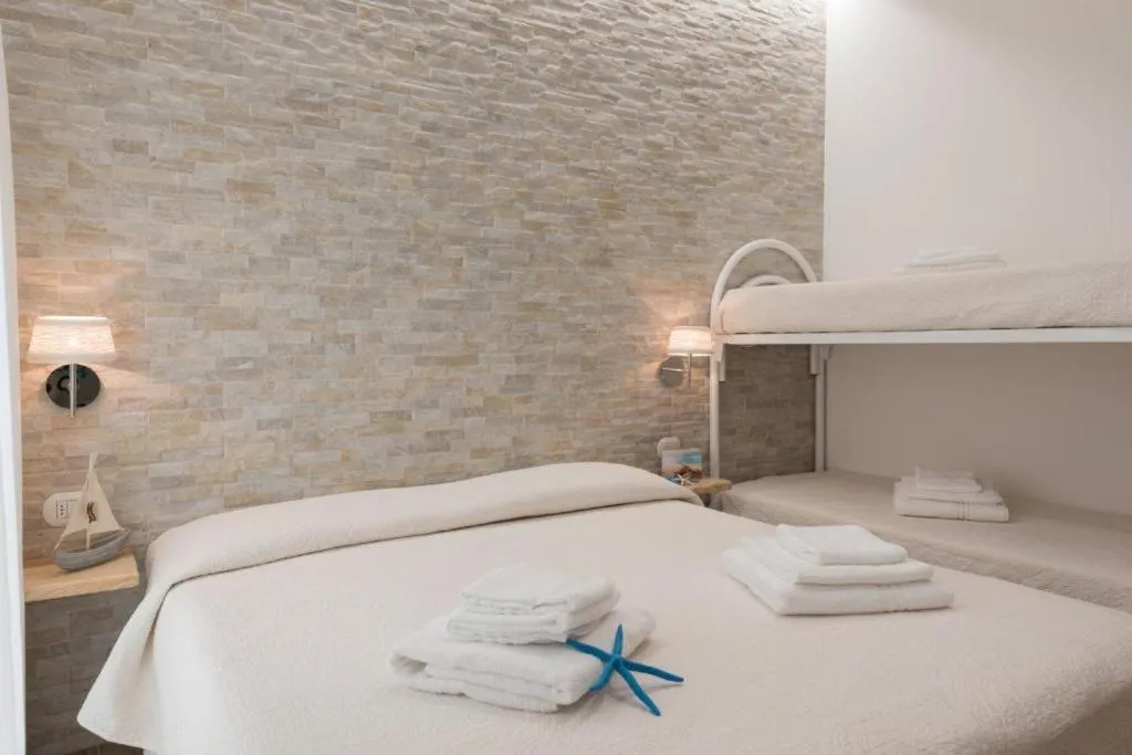 Bed in Le Gemelle Boutique Hotel