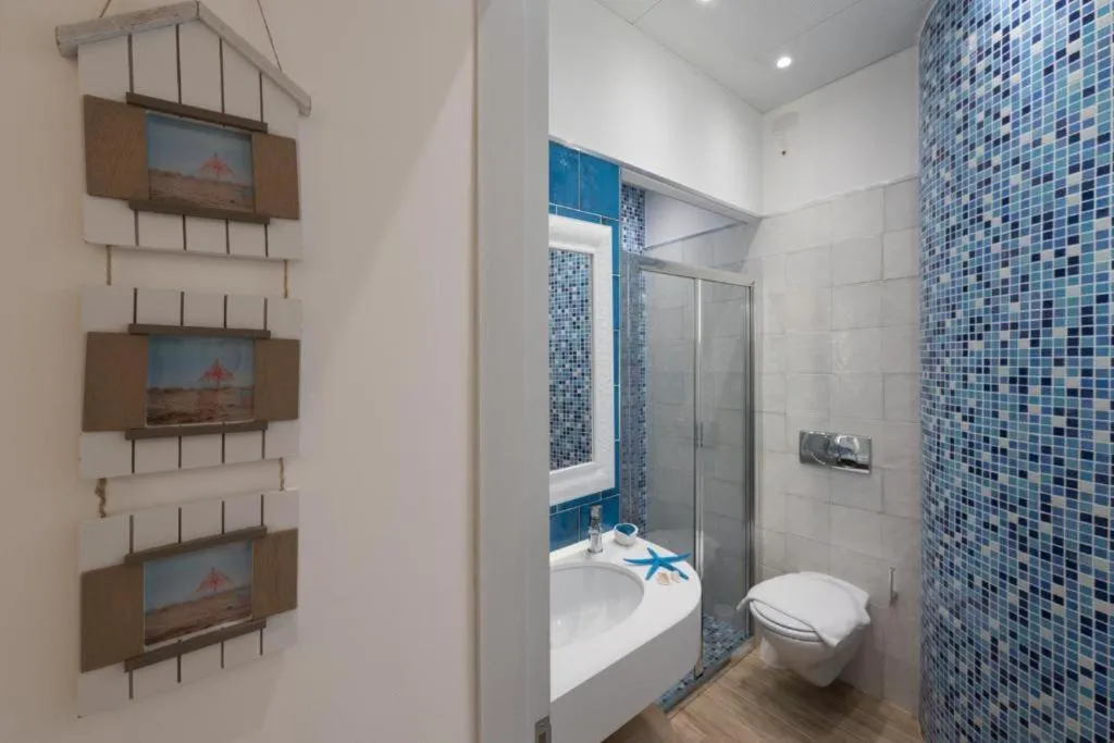 Shower in Le Gemelle Boutique Hotel