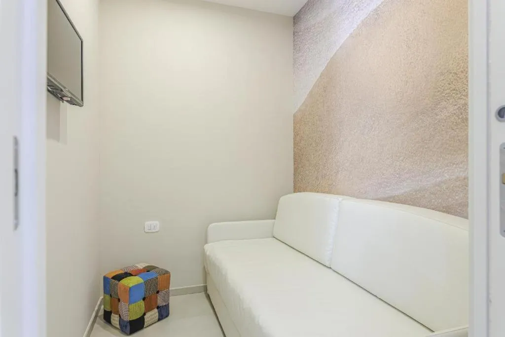 Bedroom in Le Gemelle Boutique Hotel