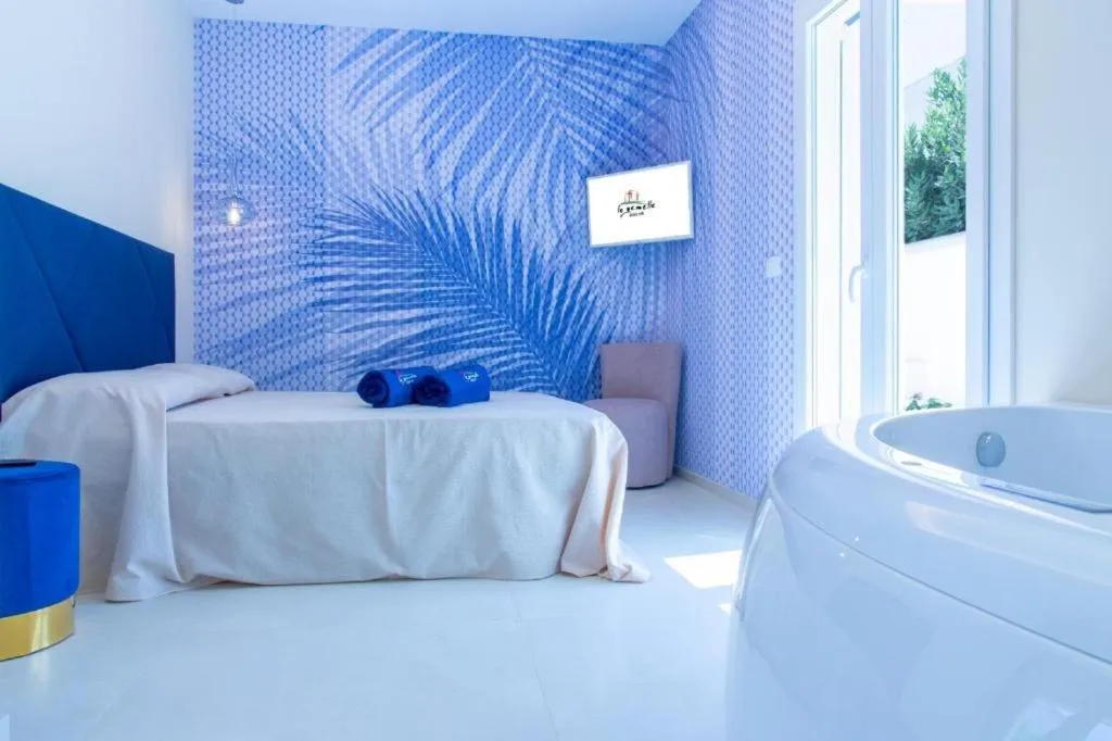 Bed in Le Gemelle Boutique Hotel