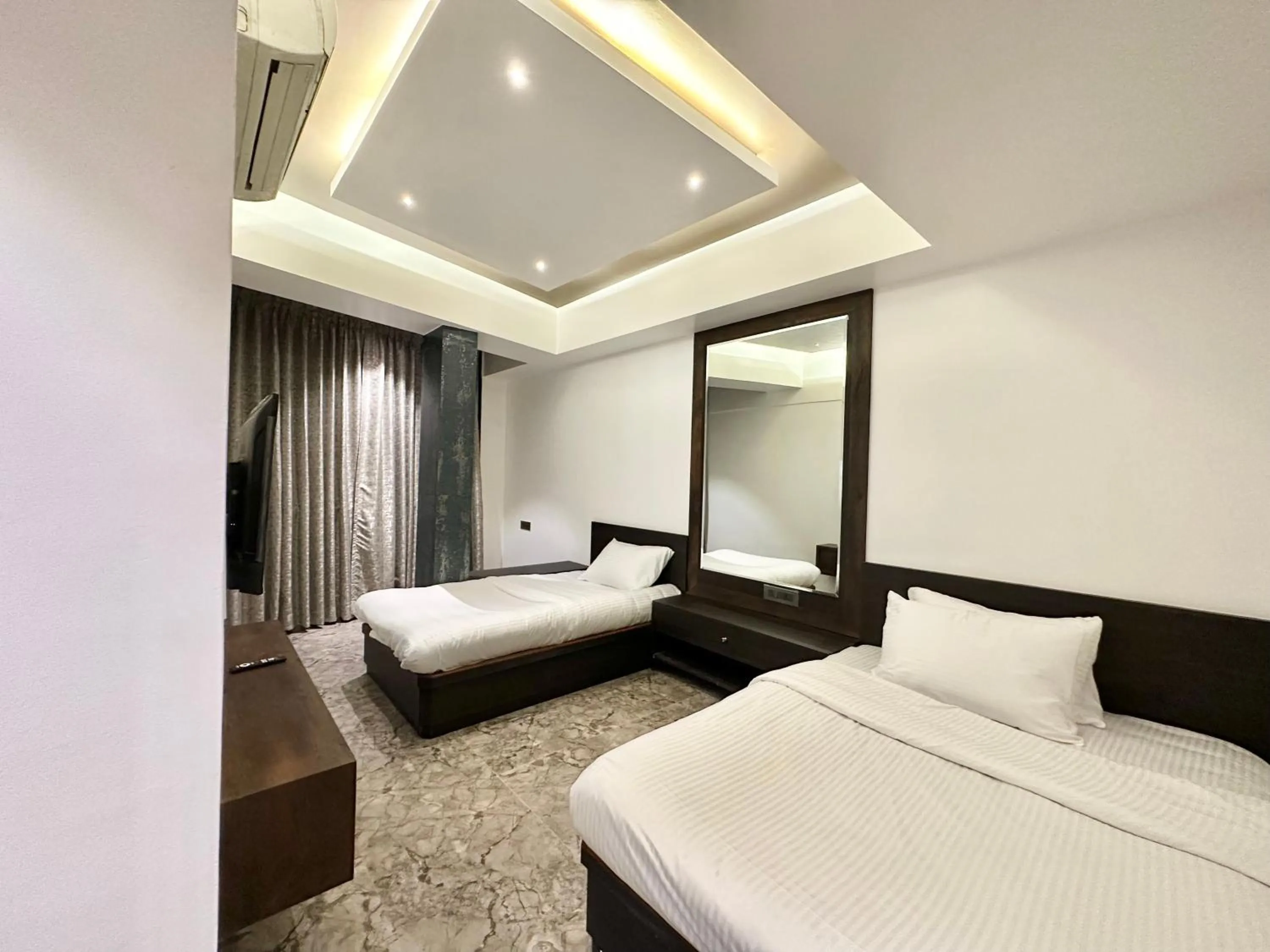 Bed in TAKHT- Executive Suites and Rooms