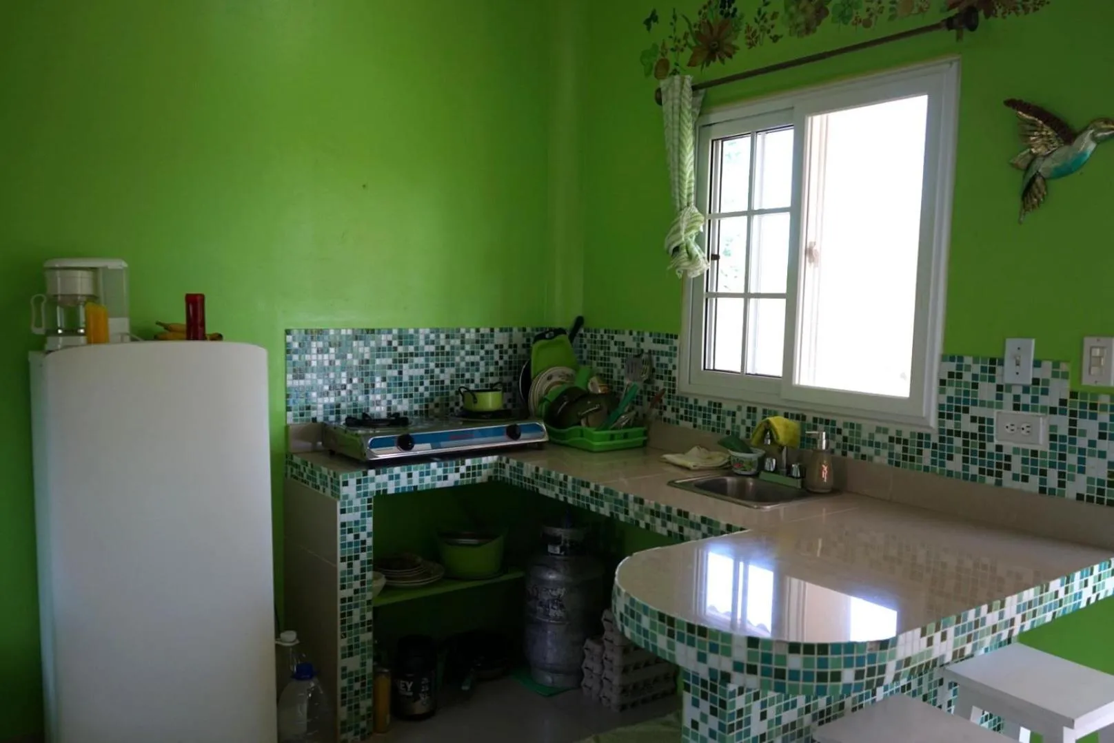 Kitchen or kitchenette in Cabañas Sherlley