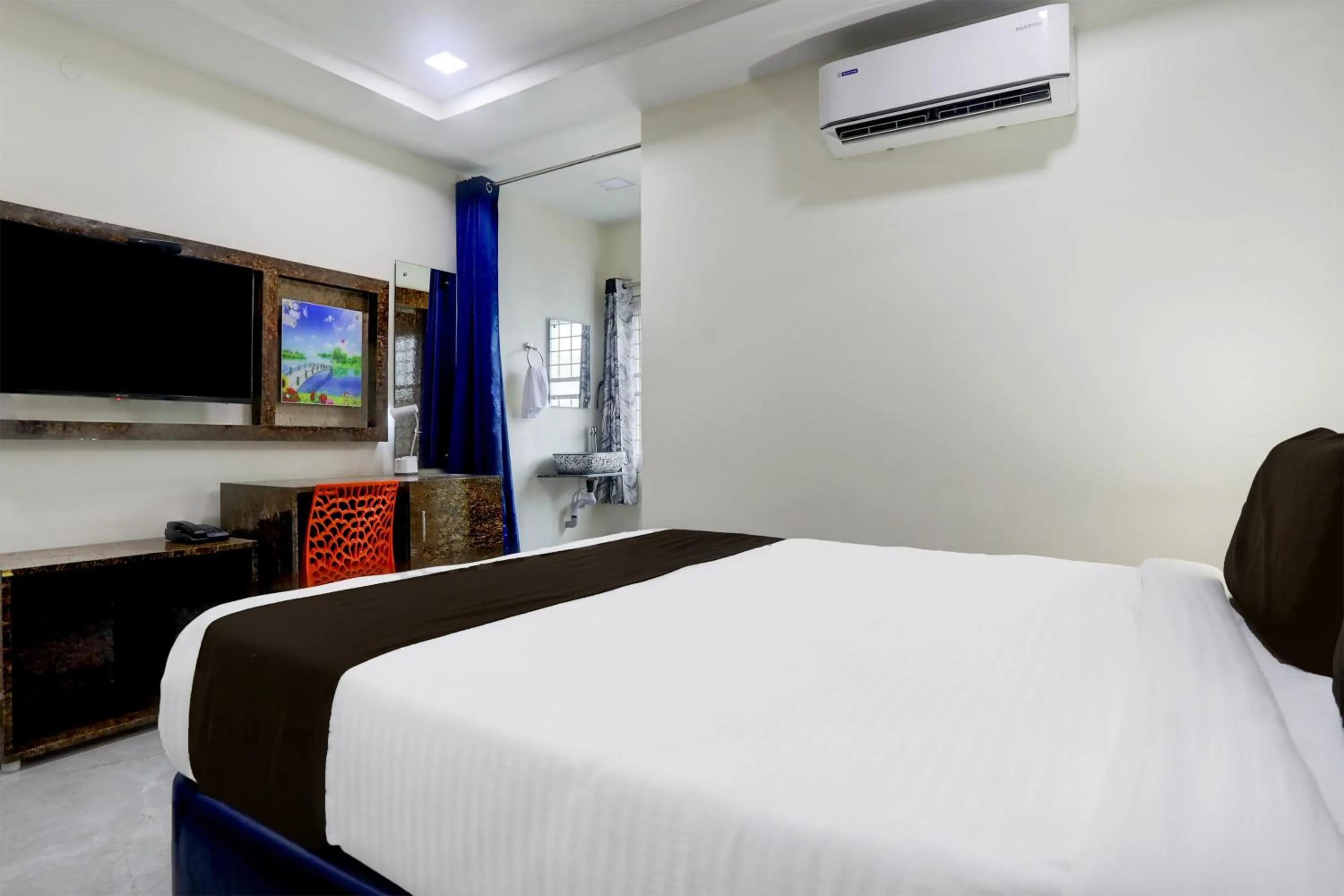 Bedroom, Bed in Super Townhouse Khammam Formerly Bluemoon