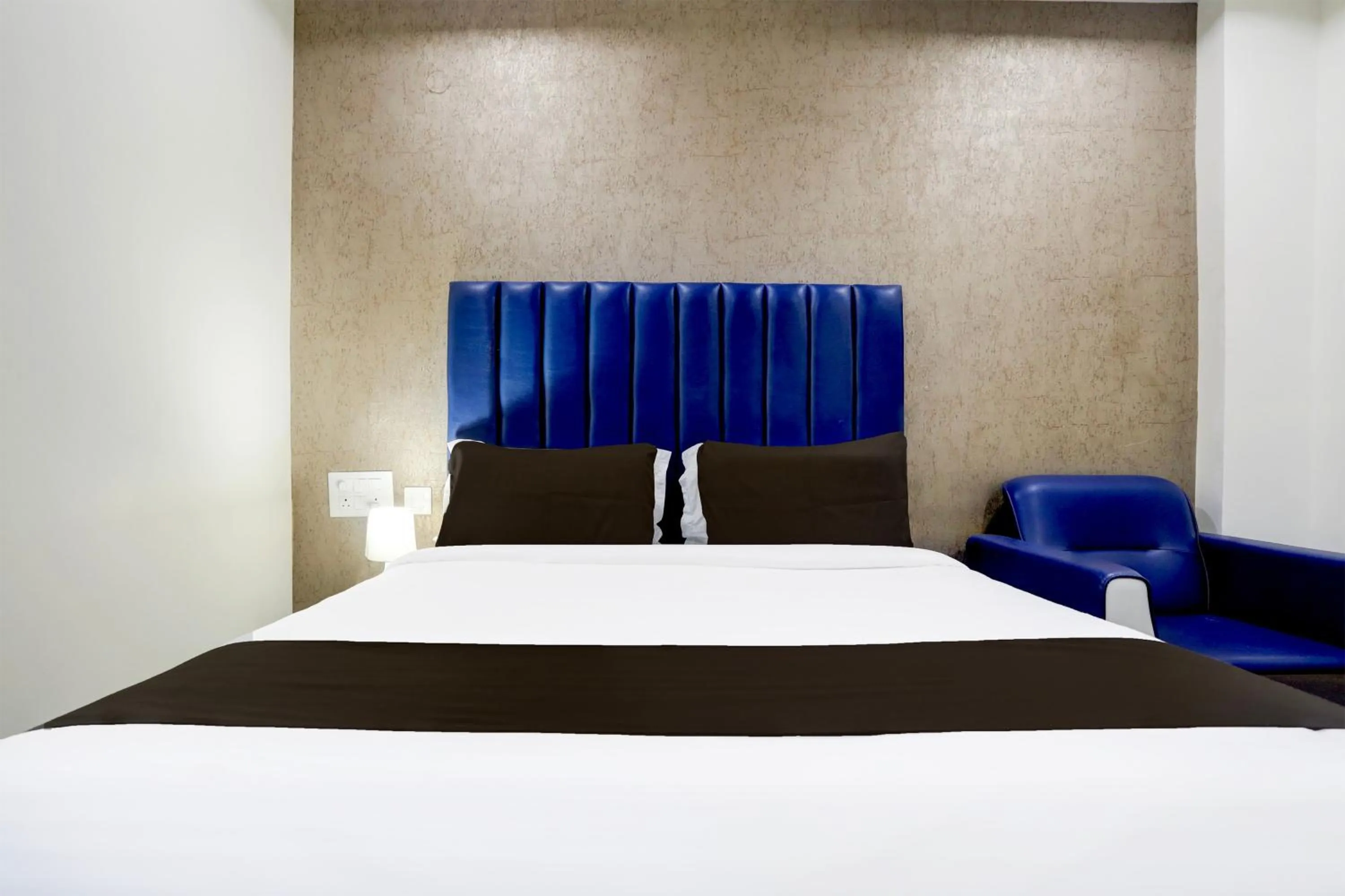 Bedroom, Bed in Super Townhouse Khammam Formerly Bluemoon