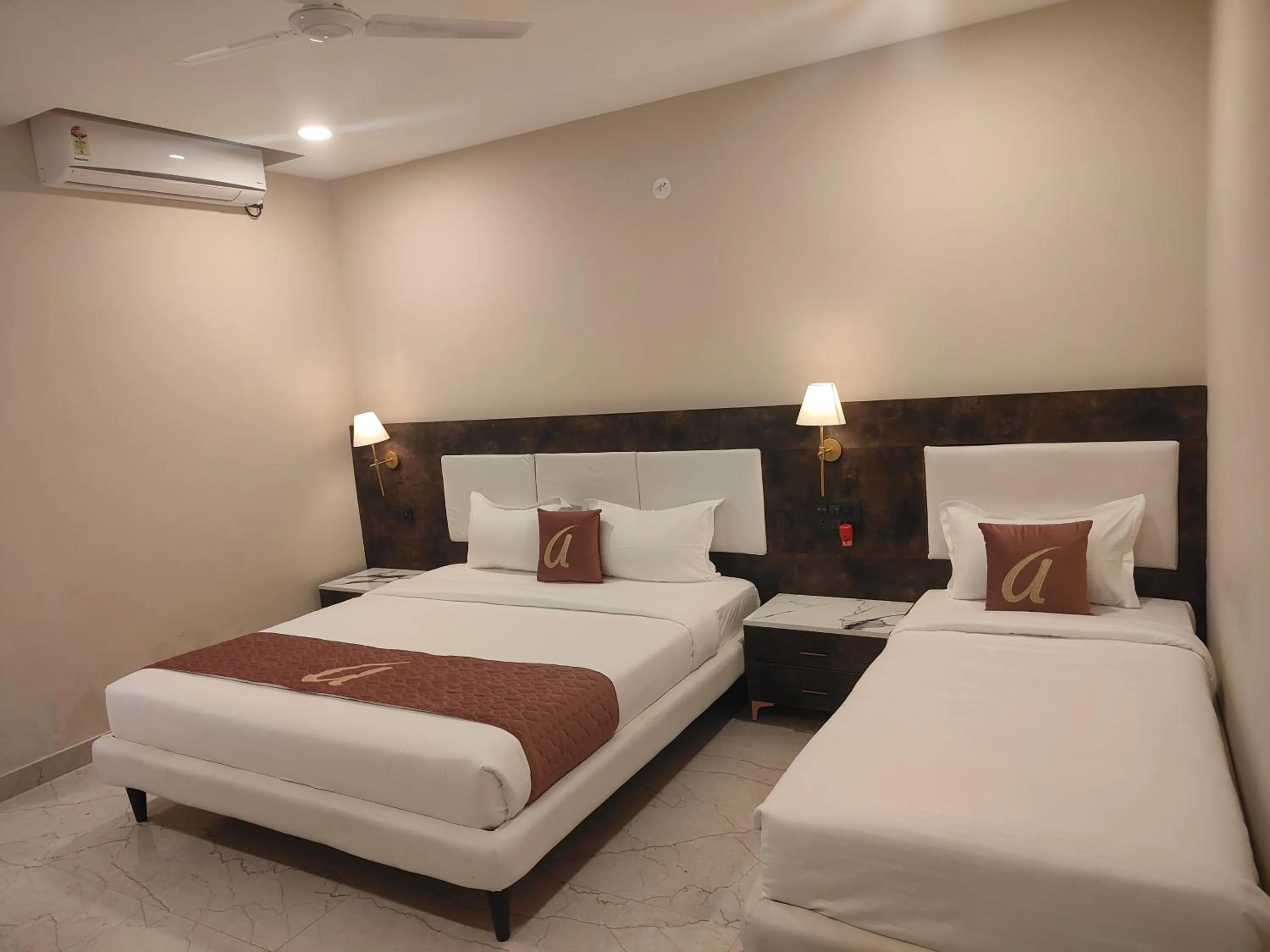Bed in Astra Hotels and Suites - Sector 7 HSR Layout