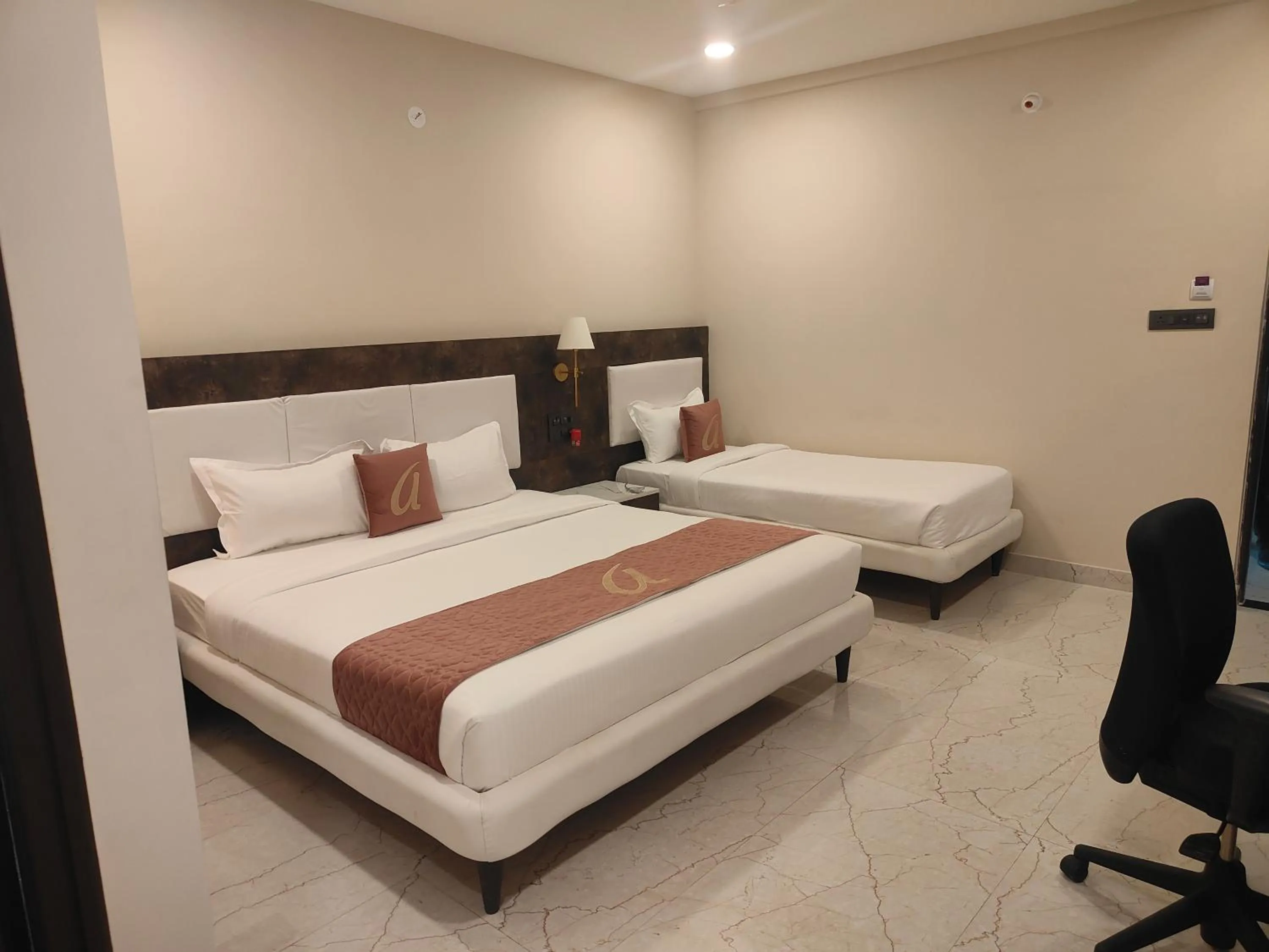 Bed in Astra Hotels and Suites - Sector 7 HSR Layout