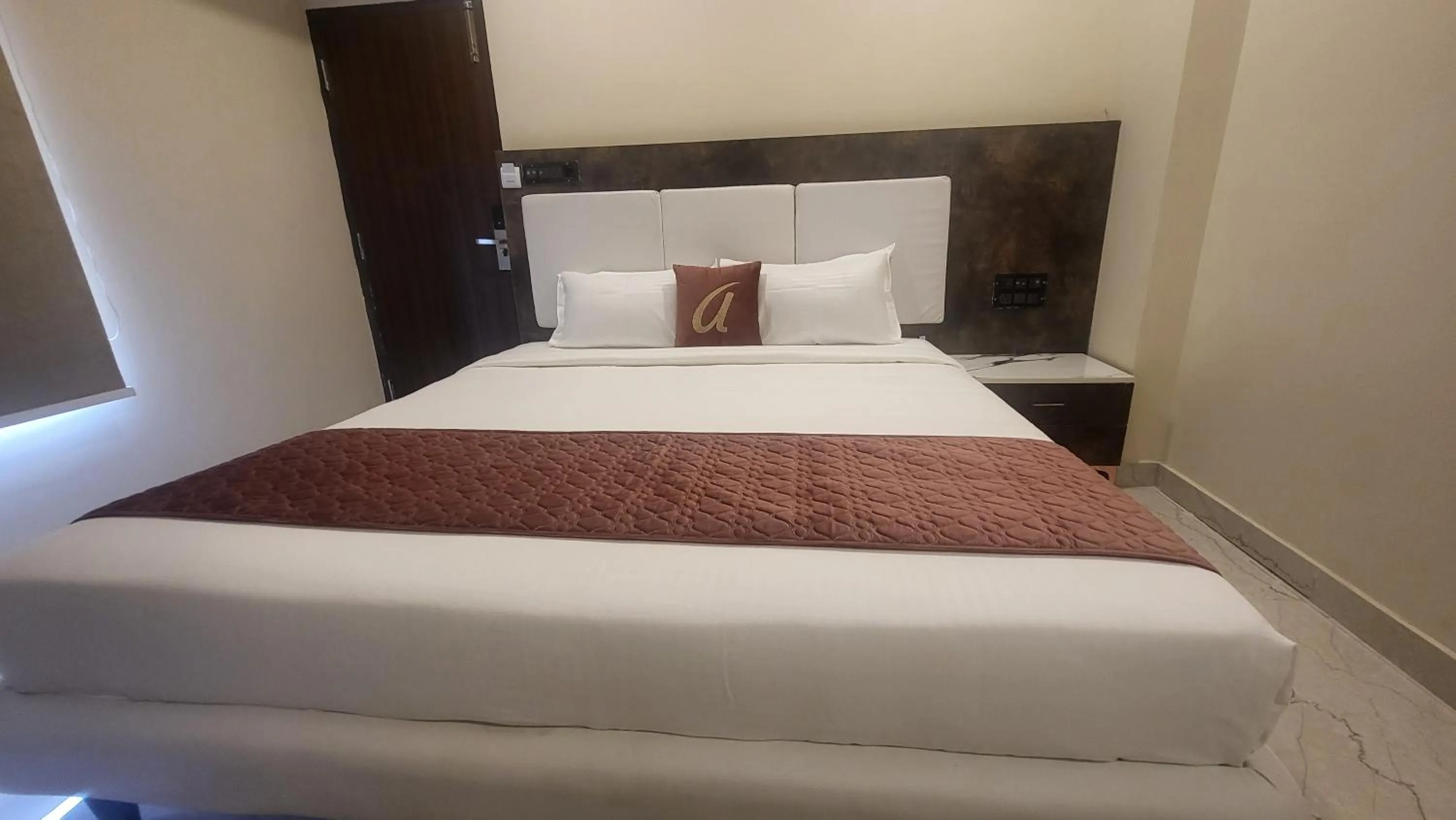 Bed in Astra Hotels and Suites - Sector 7 HSR Layout