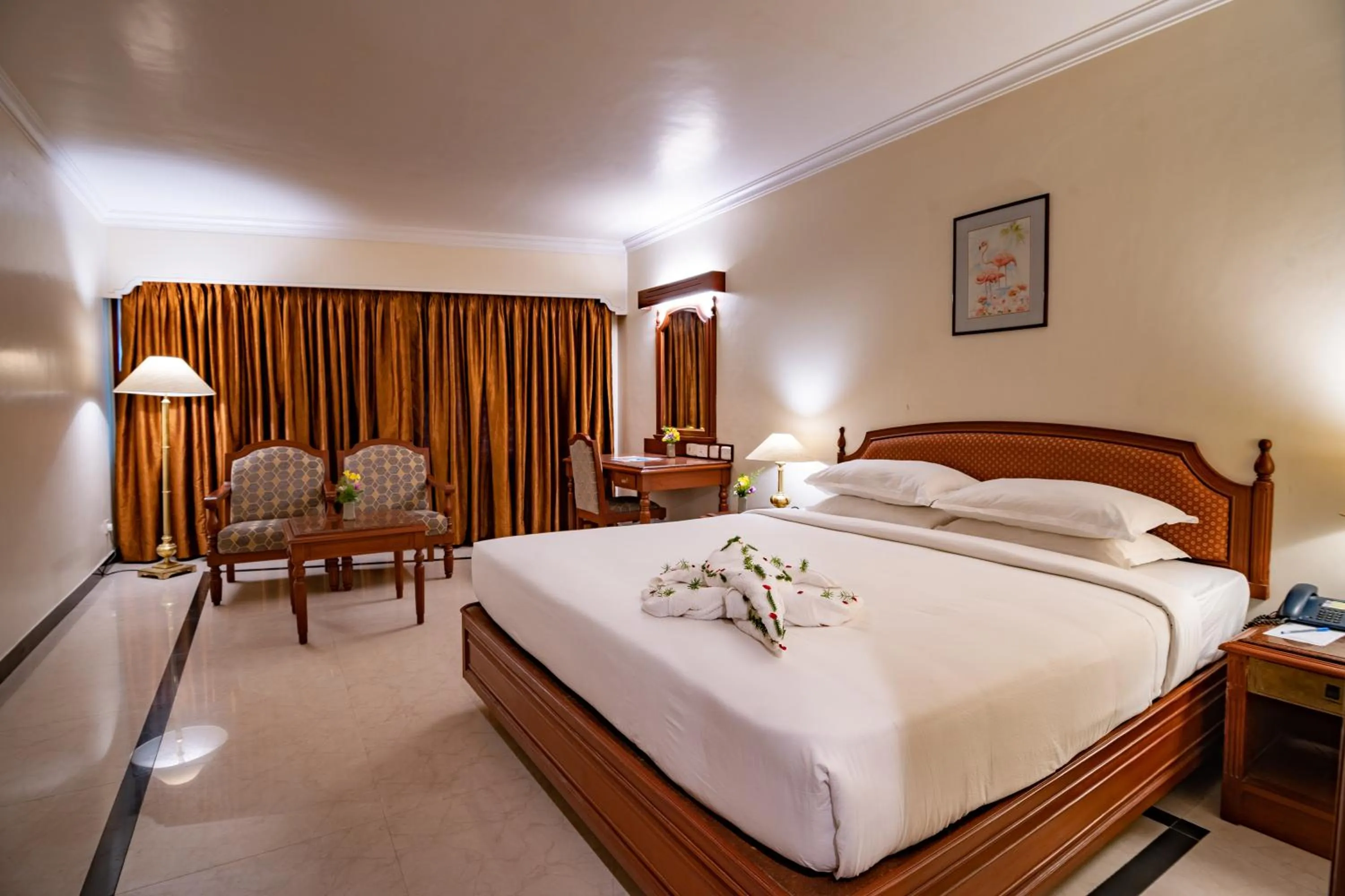 Bed in Hotel Annamalai International