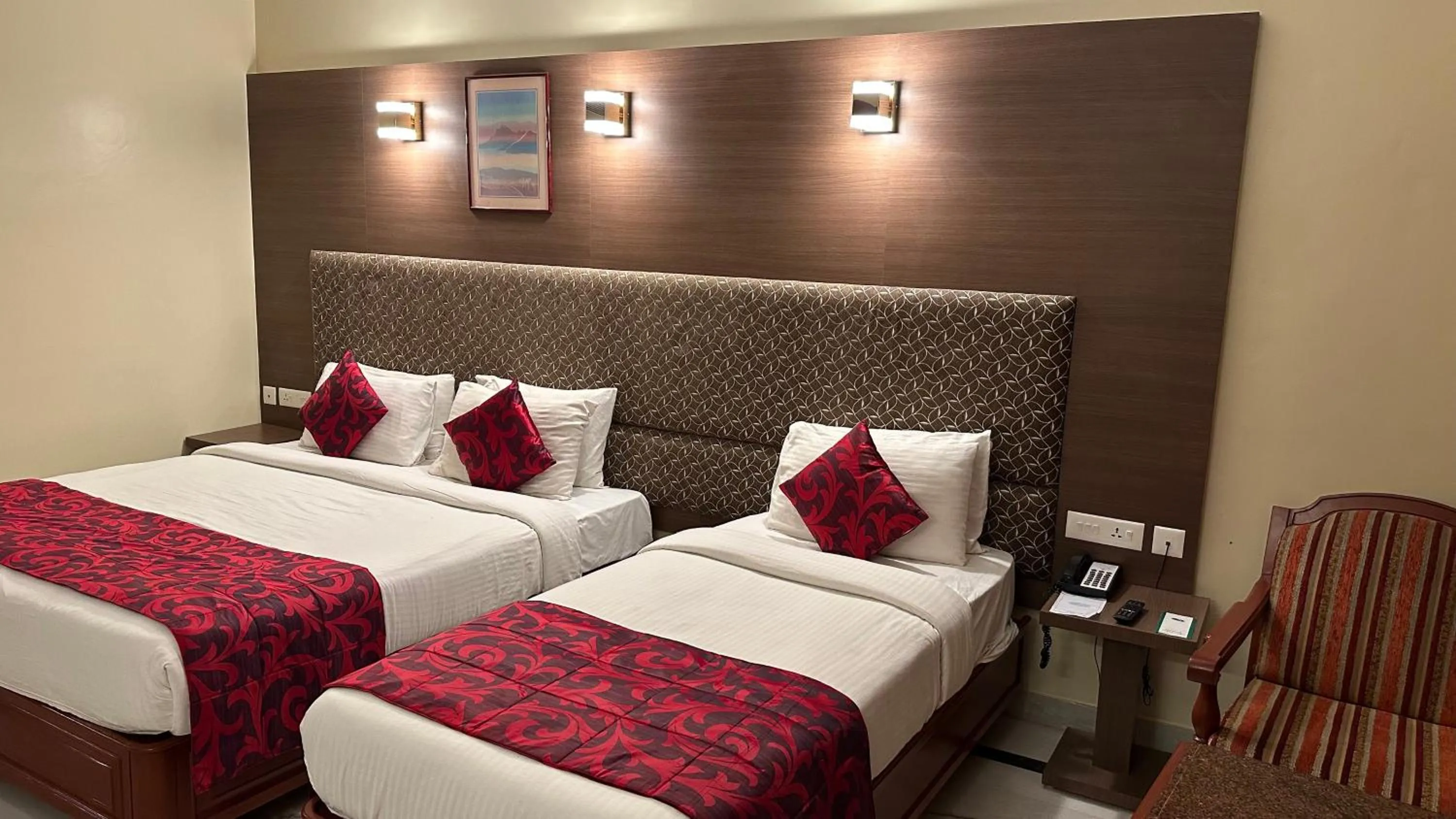 Bed in Hotel Annamalai International