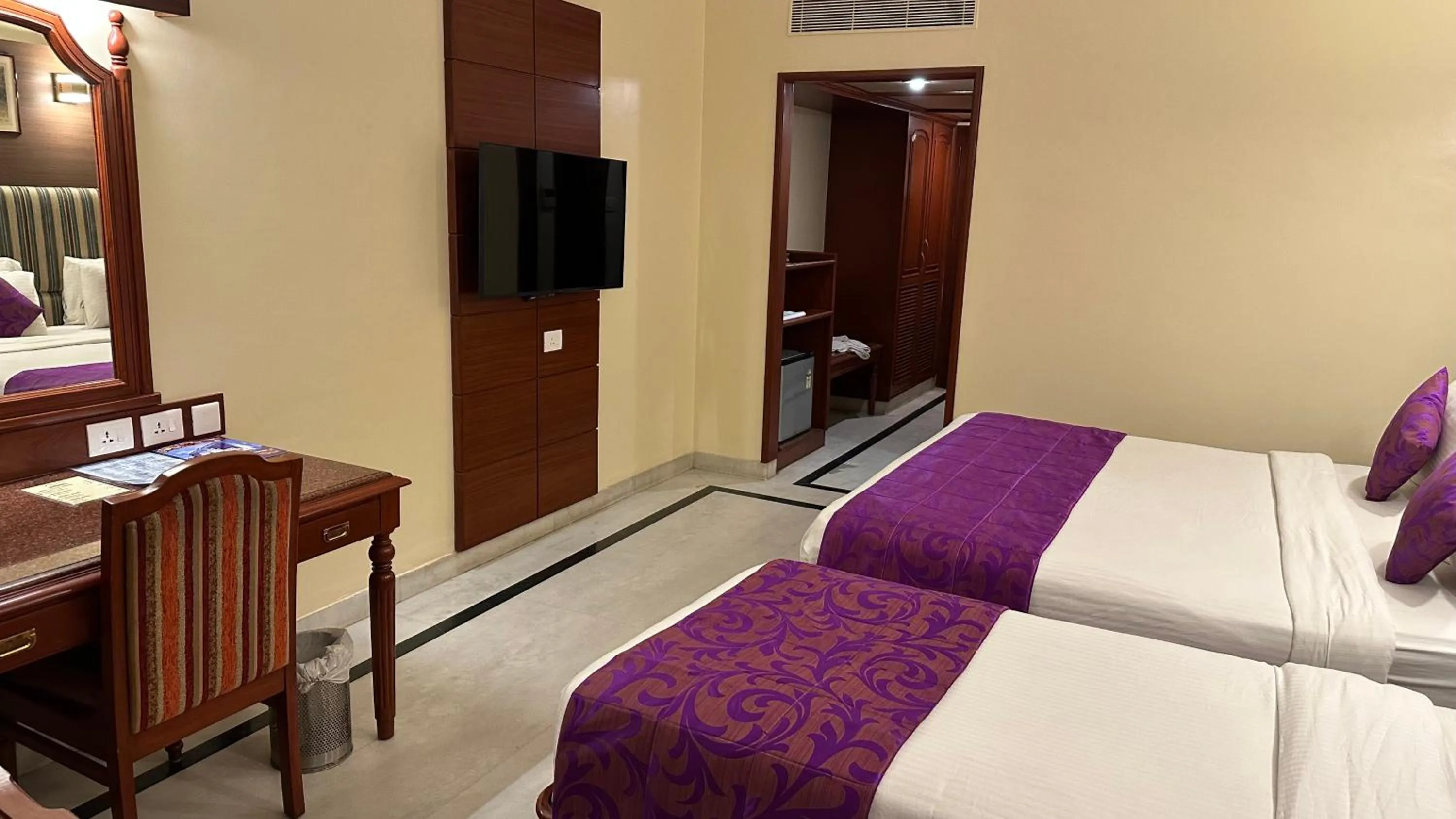 Bed in Hotel Annamalai International
