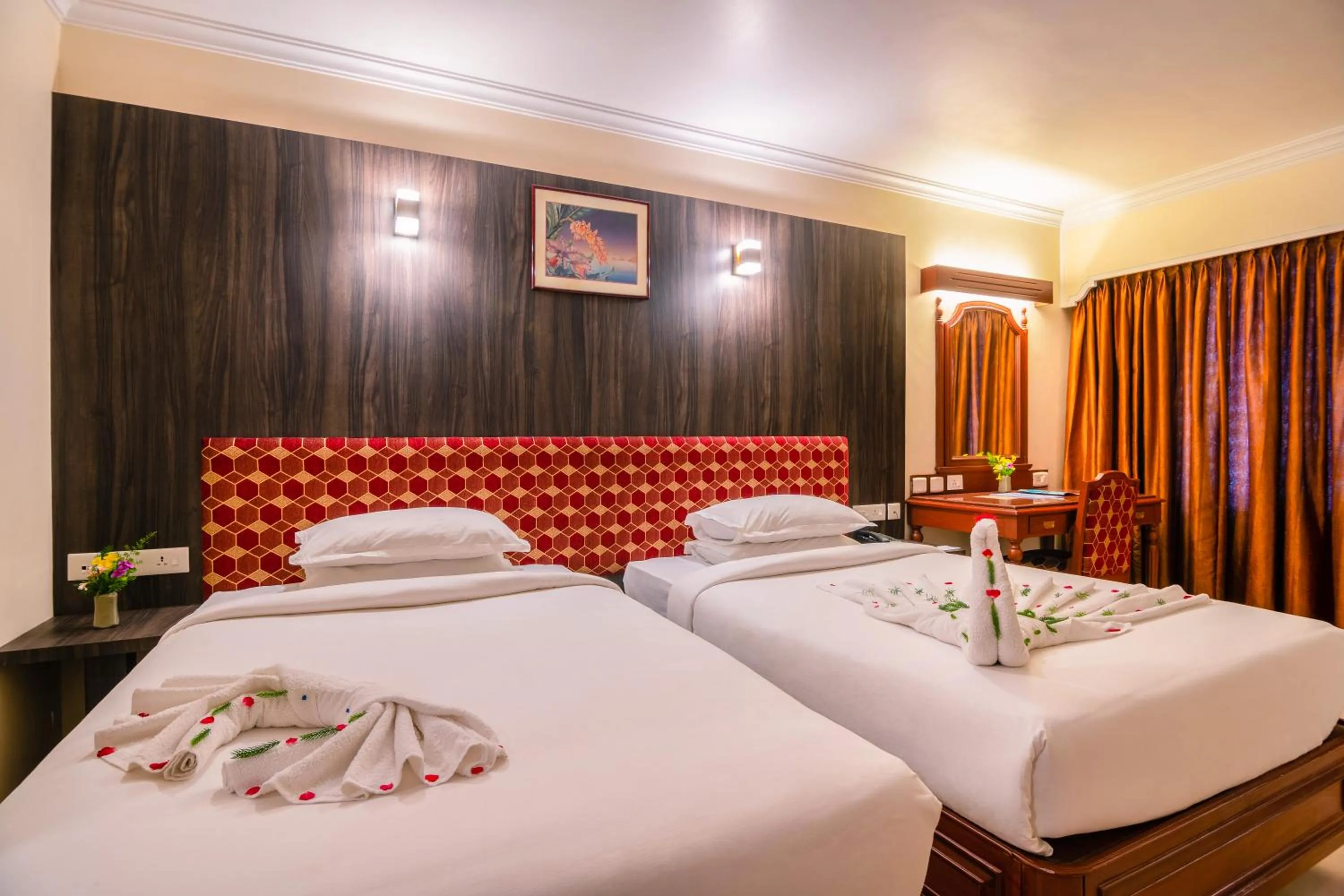 Bed in Hotel Annamalai International