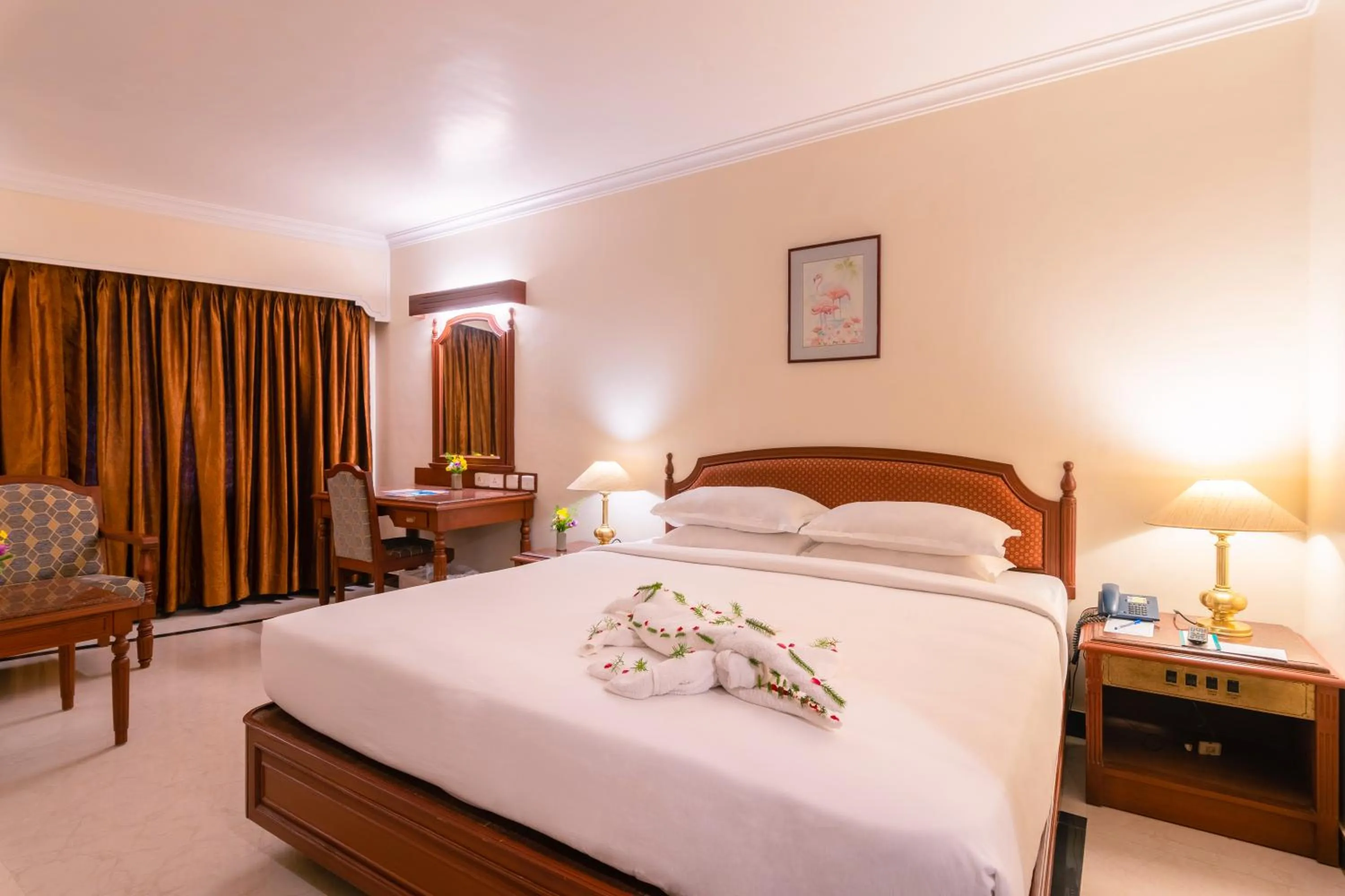 Bed in Hotel Annamalai International