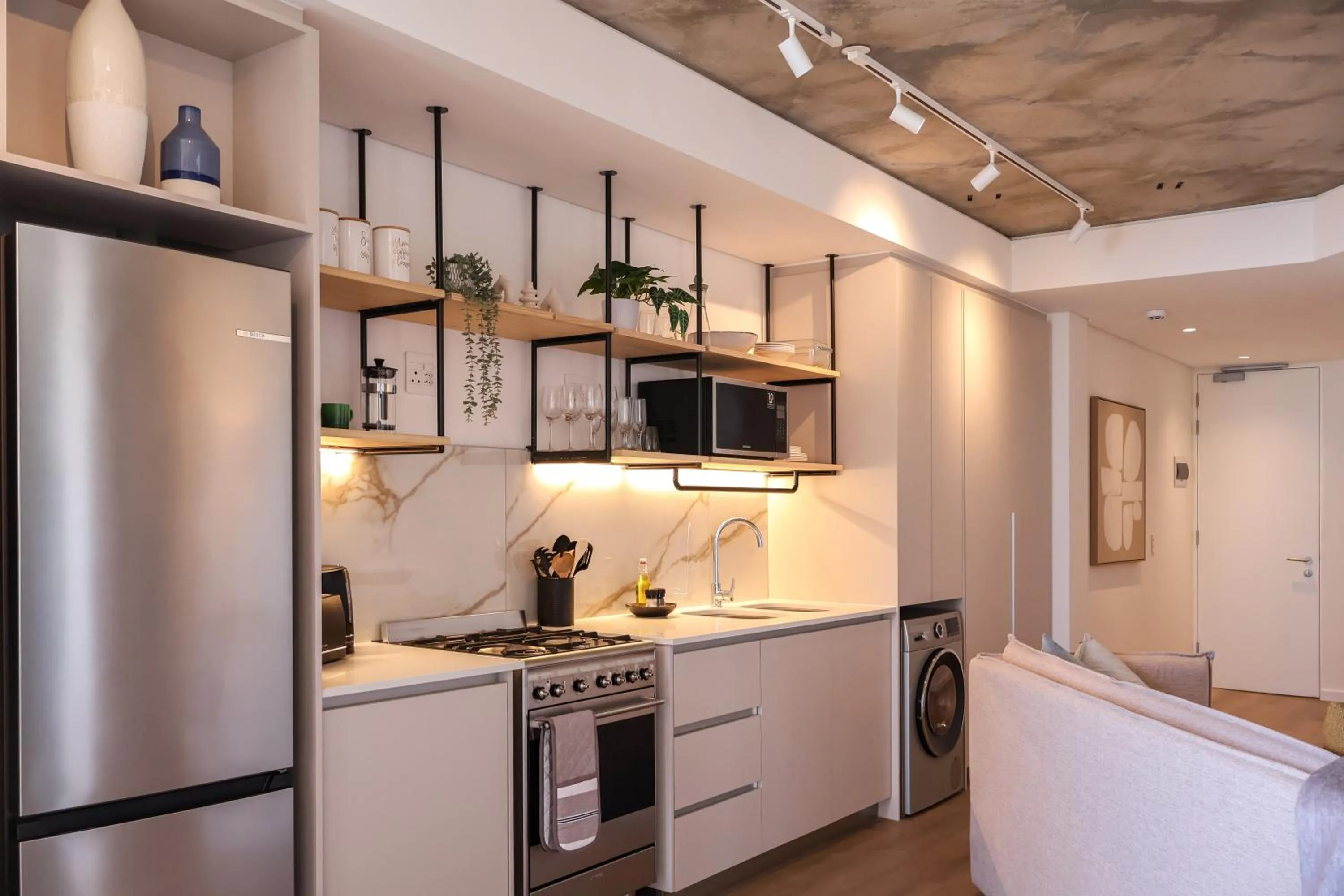 Kitchen or kitchenette in EIGHTY2 ON M - Fluent Serviced Apartments