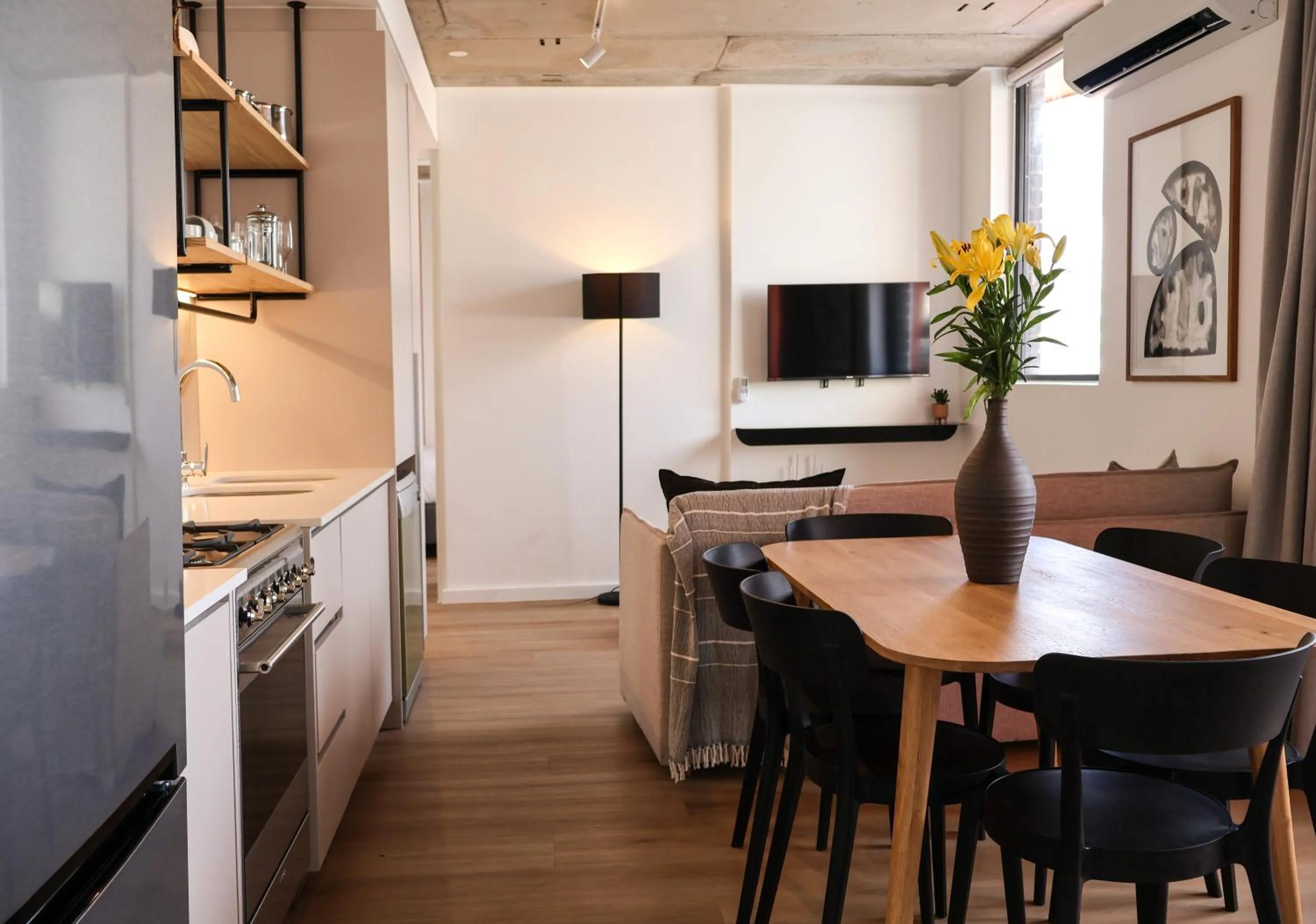 TV and multimedia in EIGHTY2 ON M - Fluent Serviced Apartments