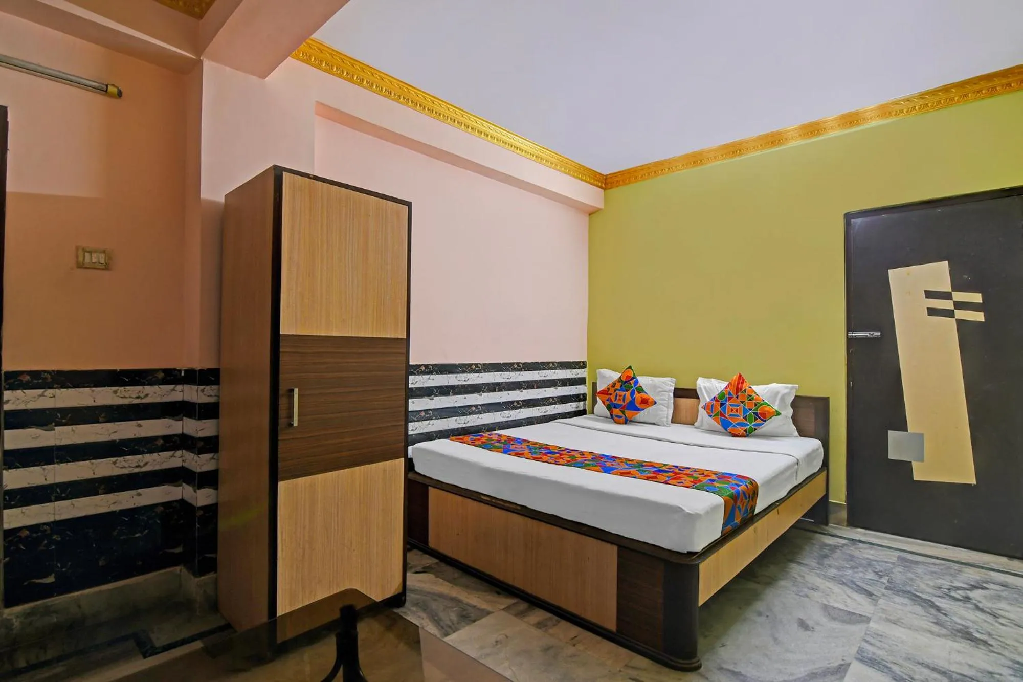 Bed in FabHotel Relyef Inn