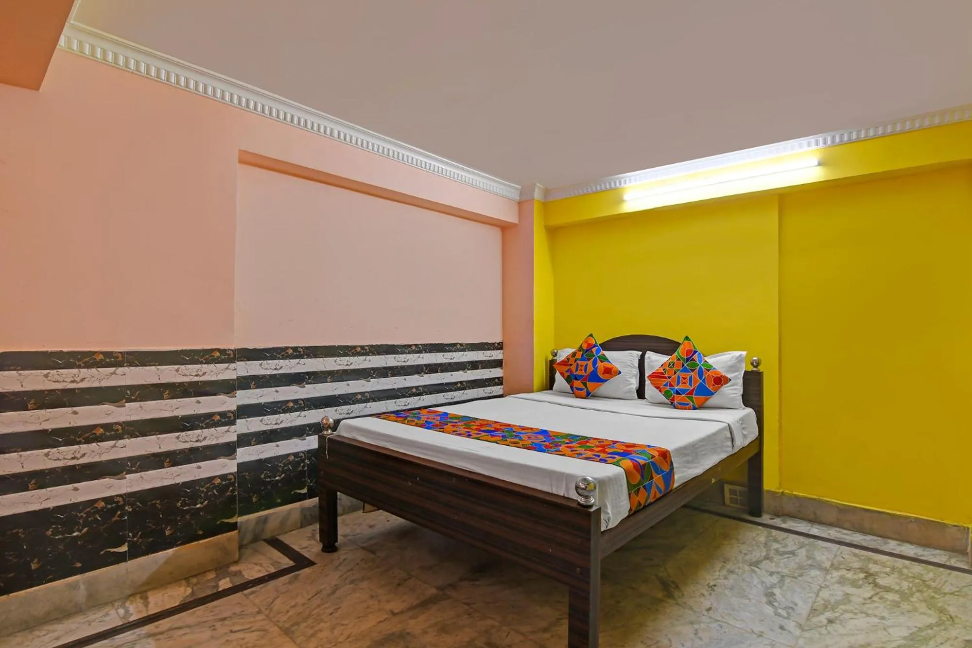 Bed in FabHotel Relyef Inn