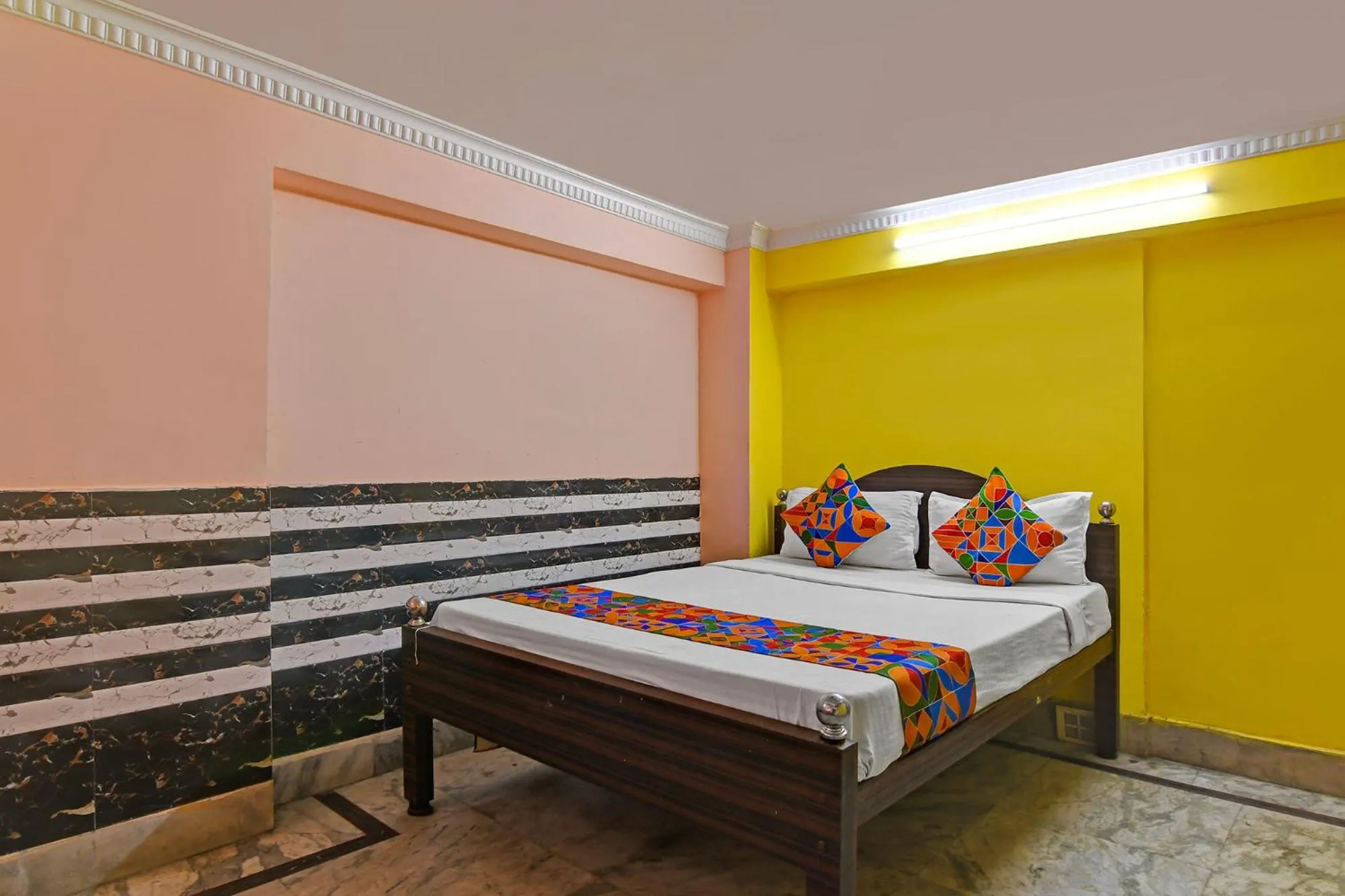 Bed in FabHotel Relyef Inn