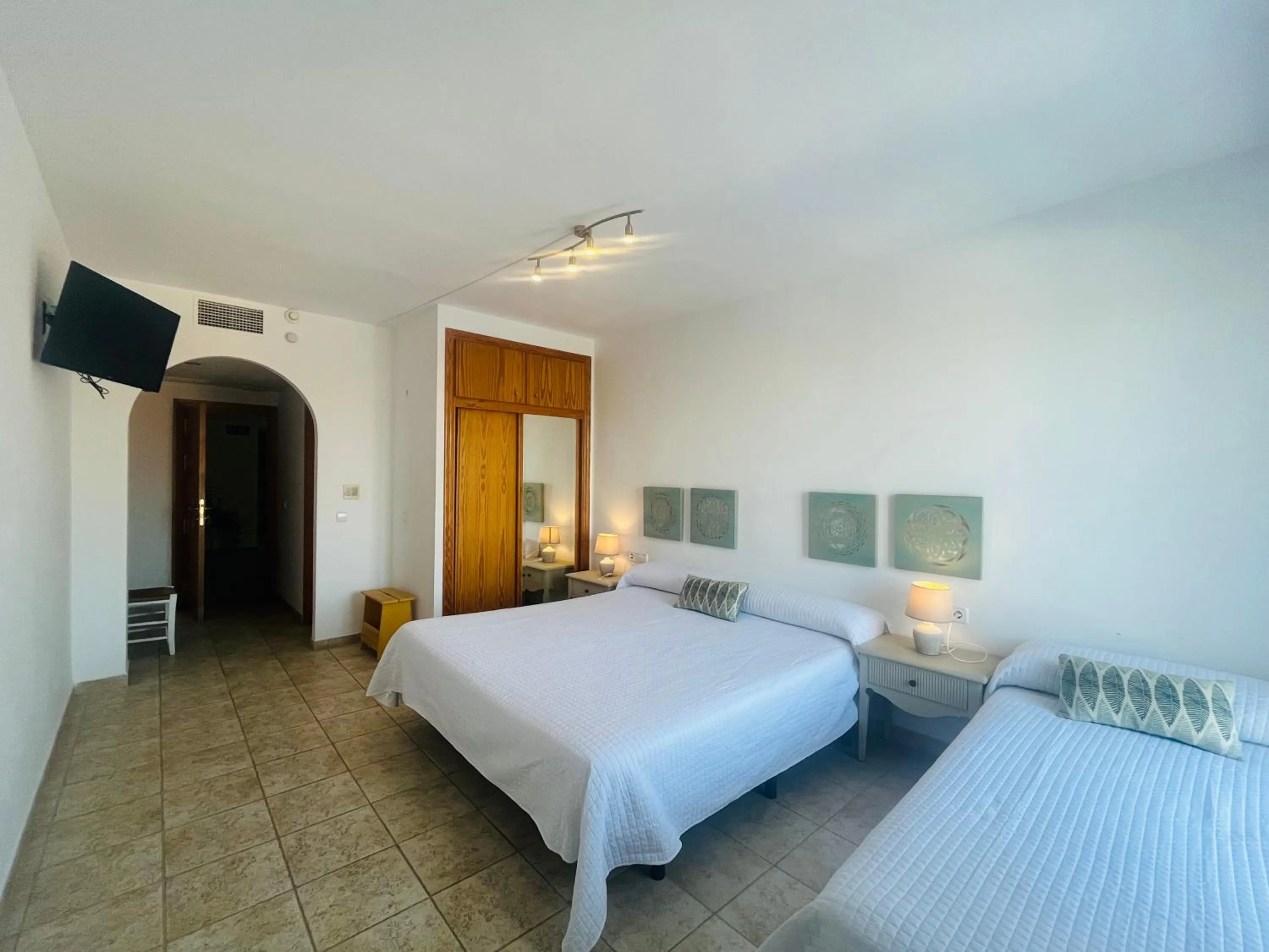 Bed in HOTEL MUSEO Lucainena