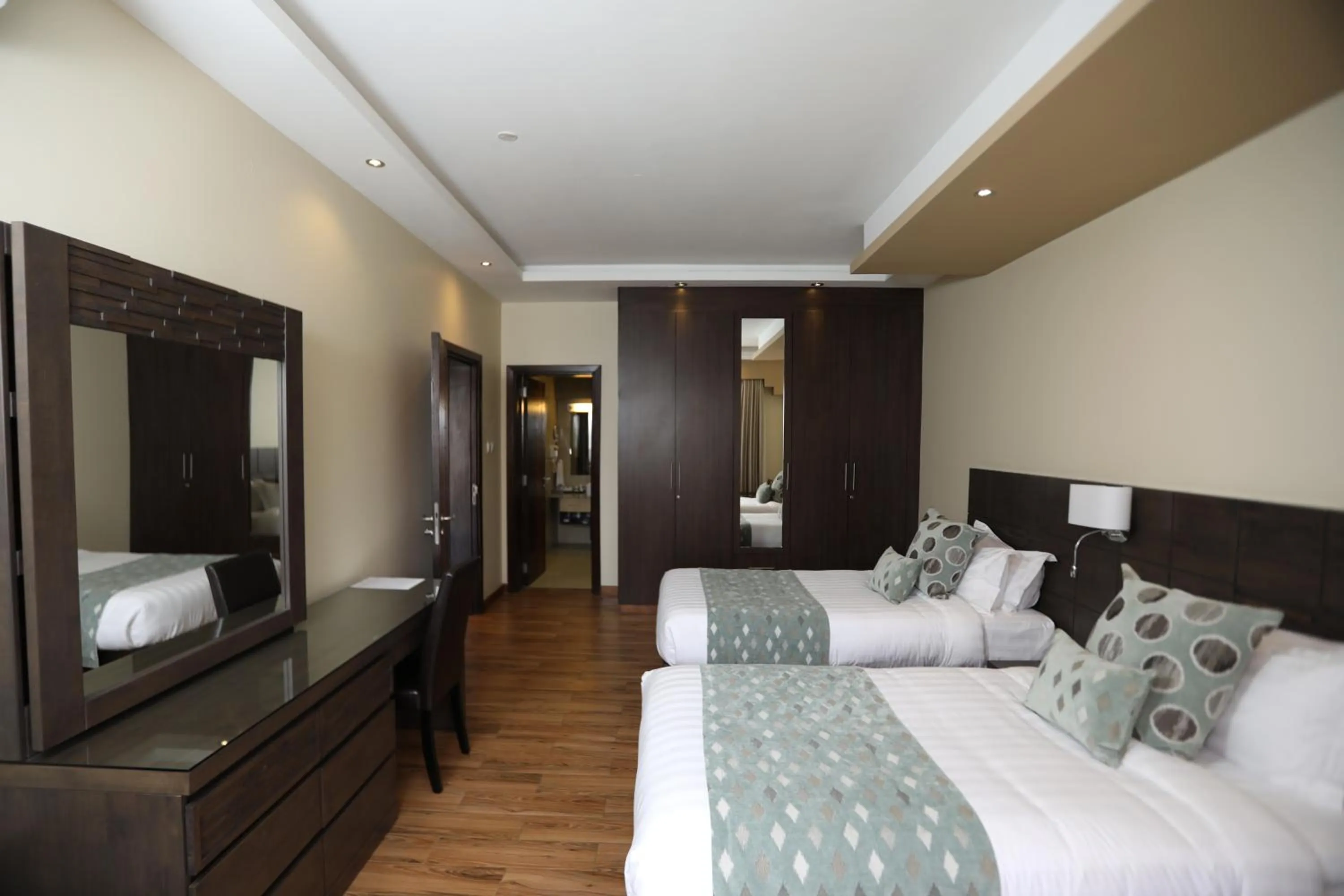 Bedroom, Bed in Bidwood Suite Hotel