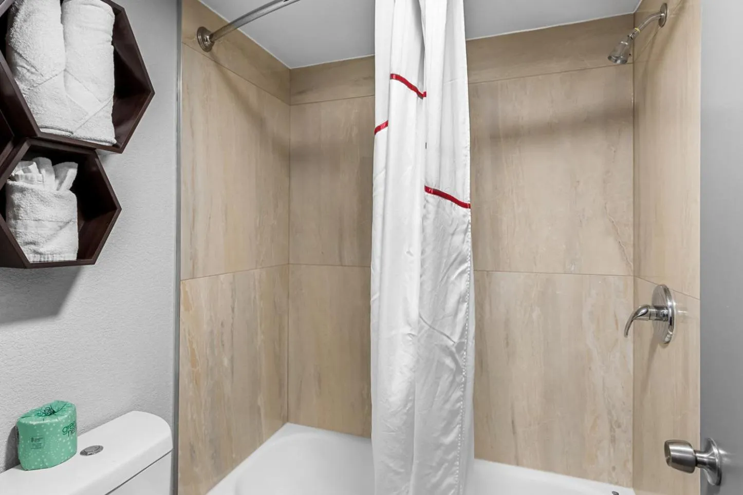 Bathroom in HomeTowne Studios by Red Roof Richmond - Airport Sandston