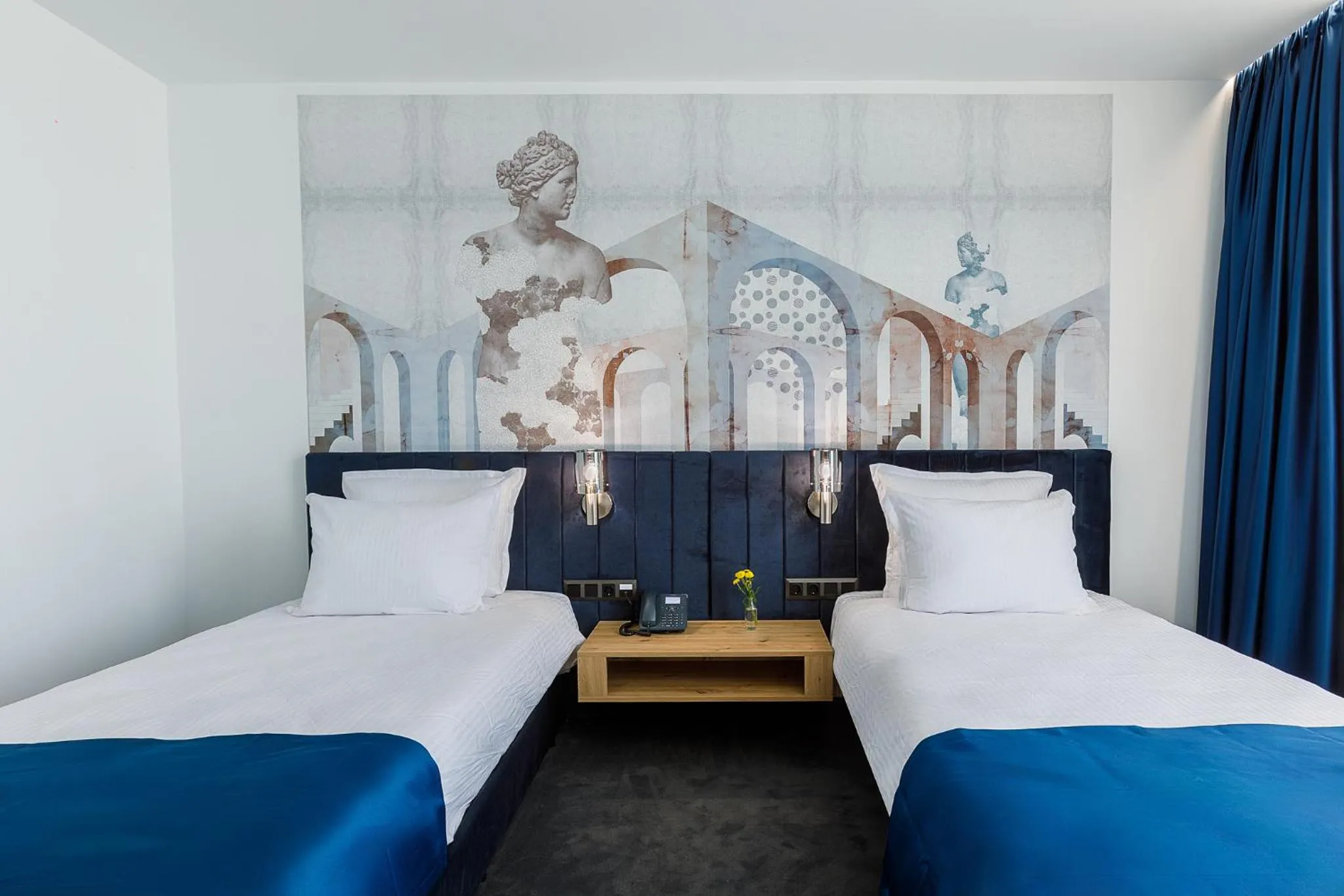 Bed in Blue Star Luxury Hotel