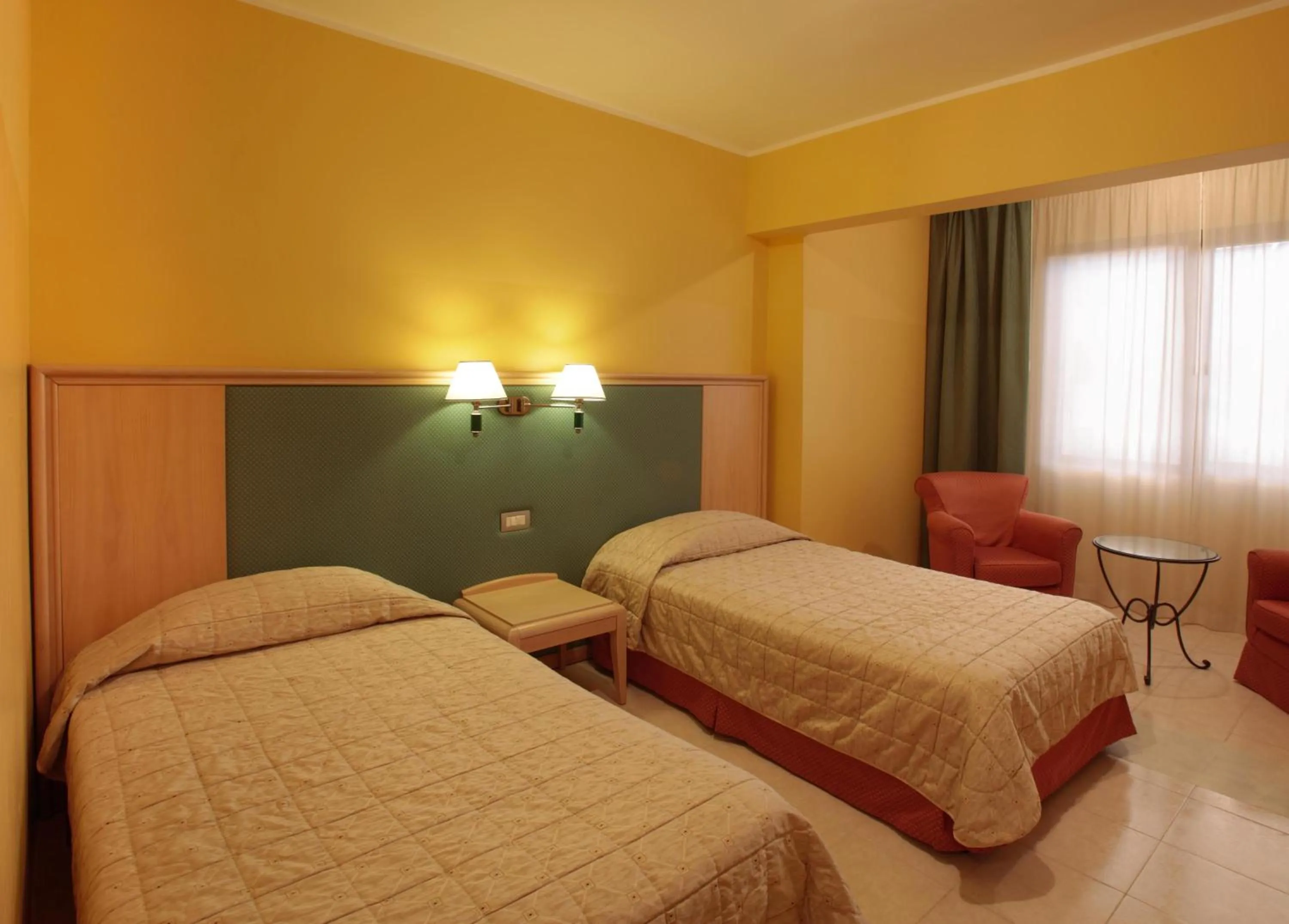 Bed in Albergo Conte Max