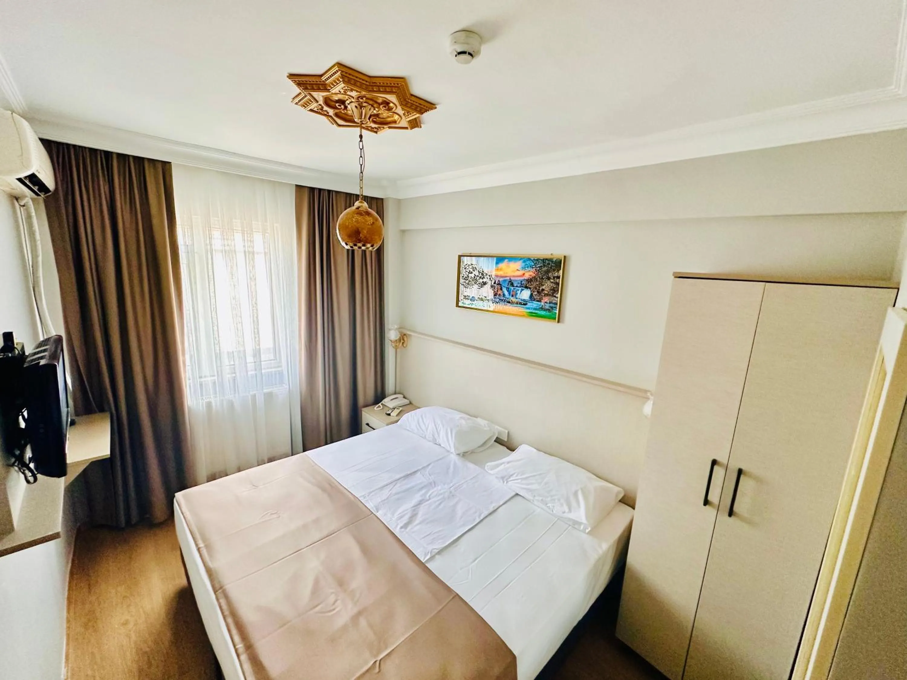 Photo of the whole room, Bed in Crowned Exclusive Hotel