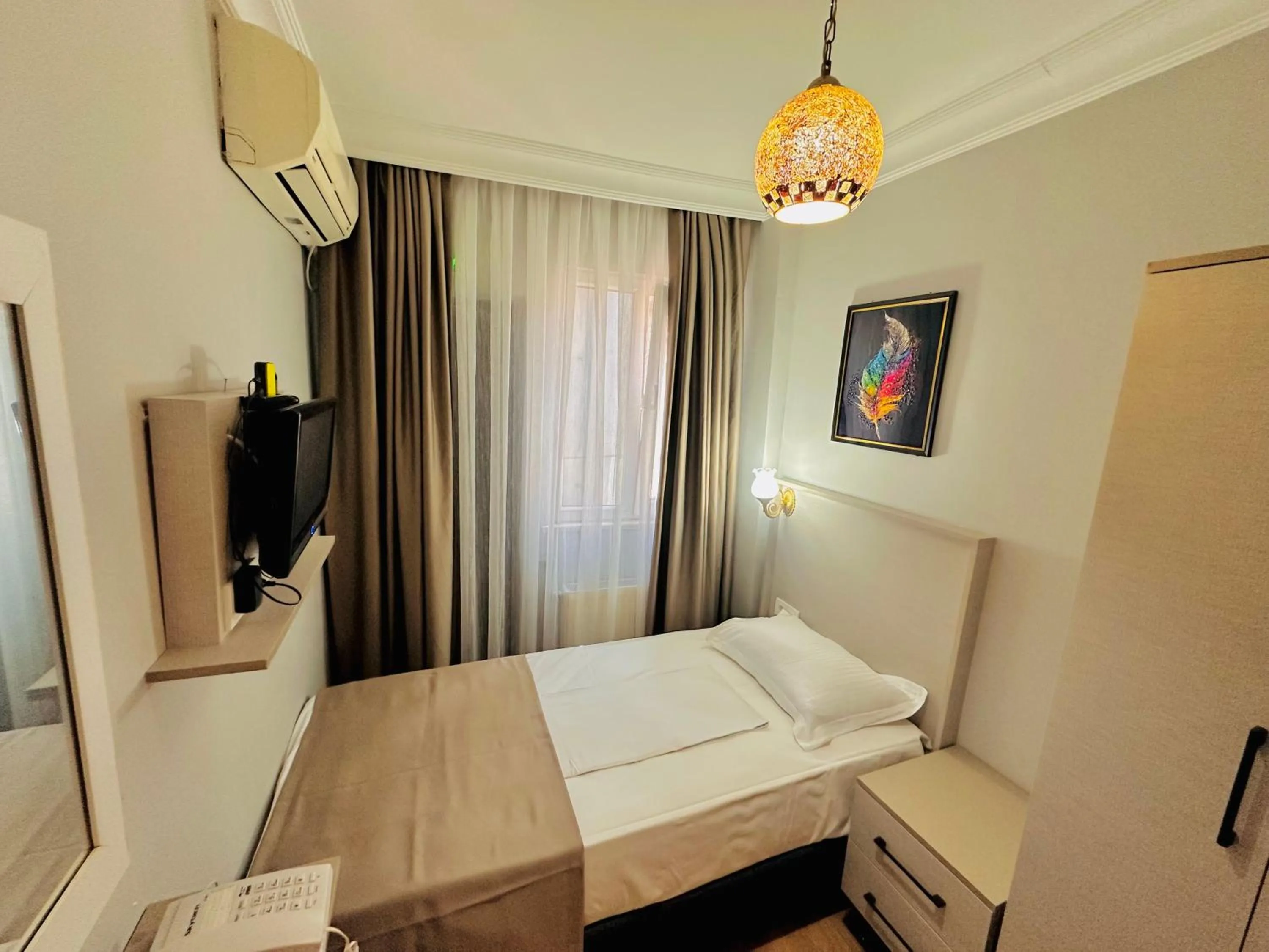 Photo of the whole room, Bed in Crowned Exclusive Hotel