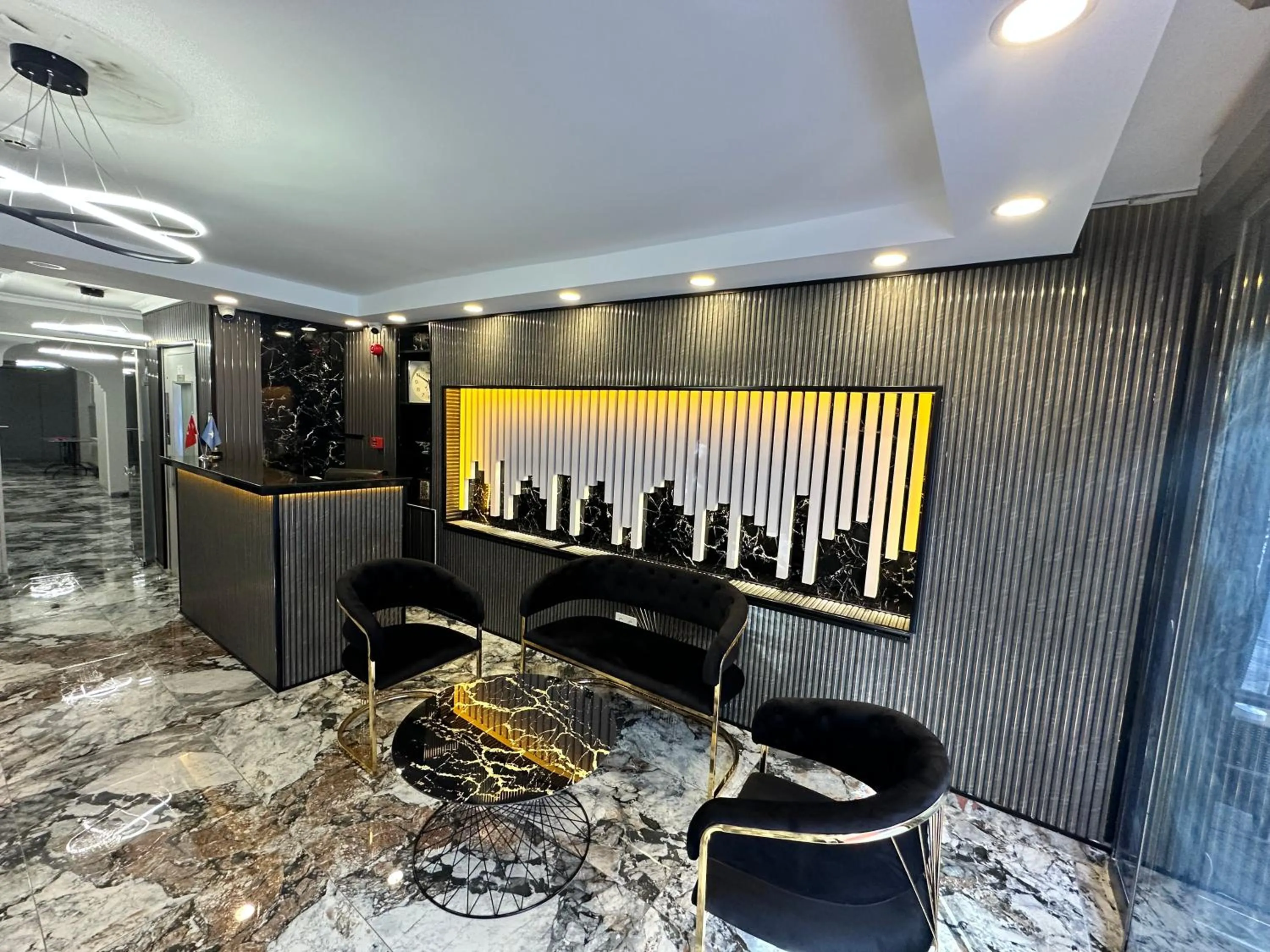 Communal lounge/ TV room in Crowned Exclusive Hotel