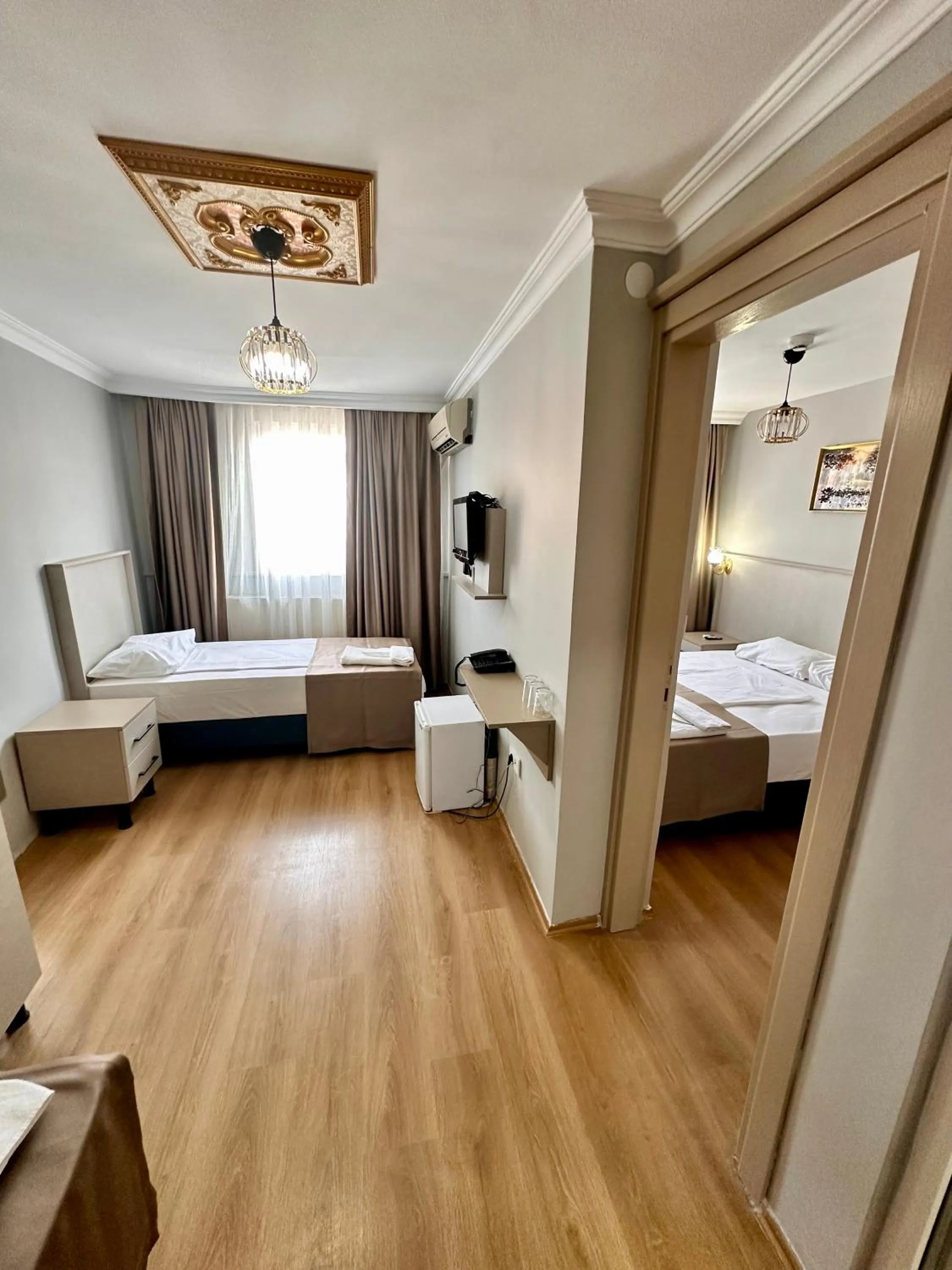 Photo of the whole room, Bed in Crowned Exclusive Hotel