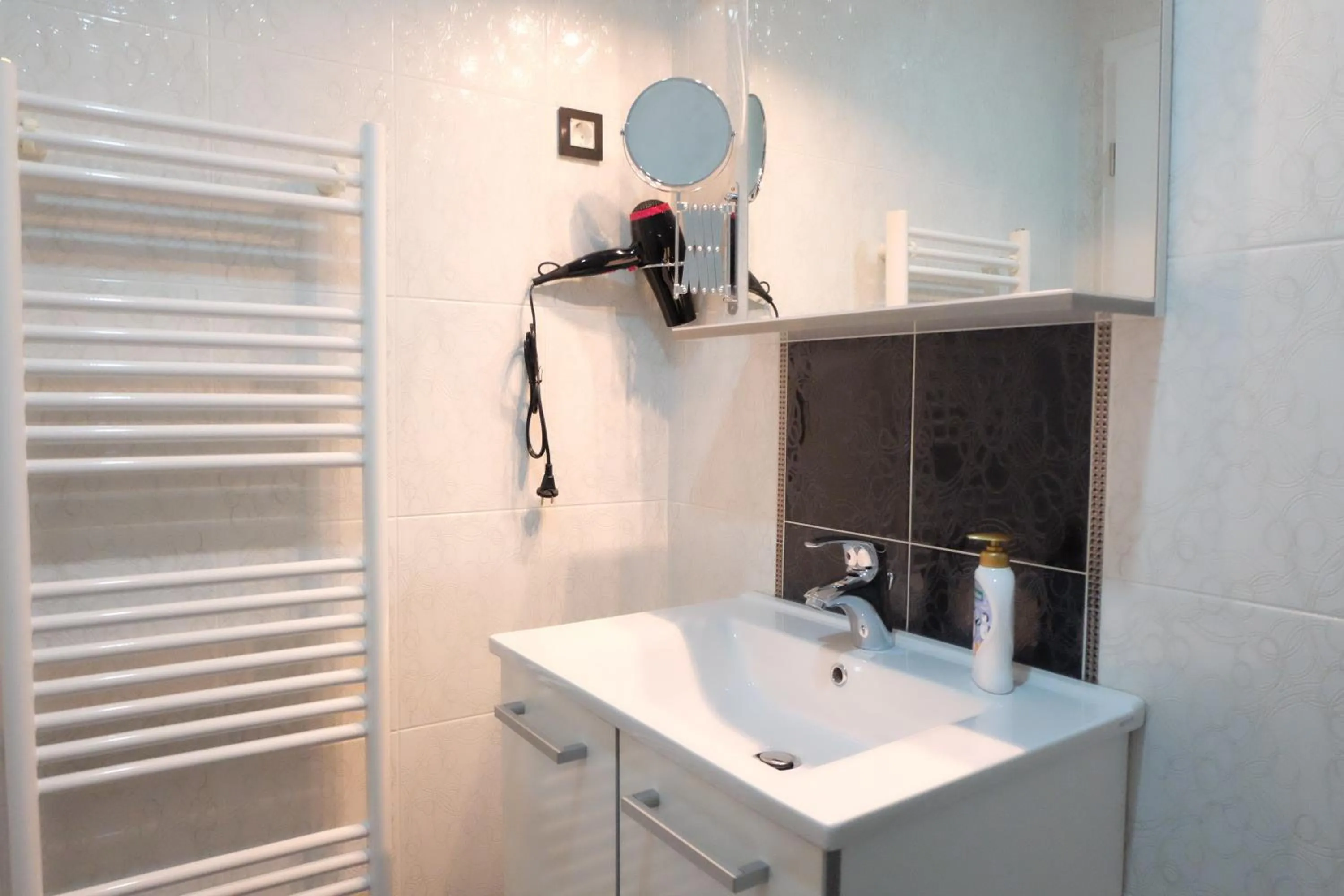 Bathroom in Luwiana Suites