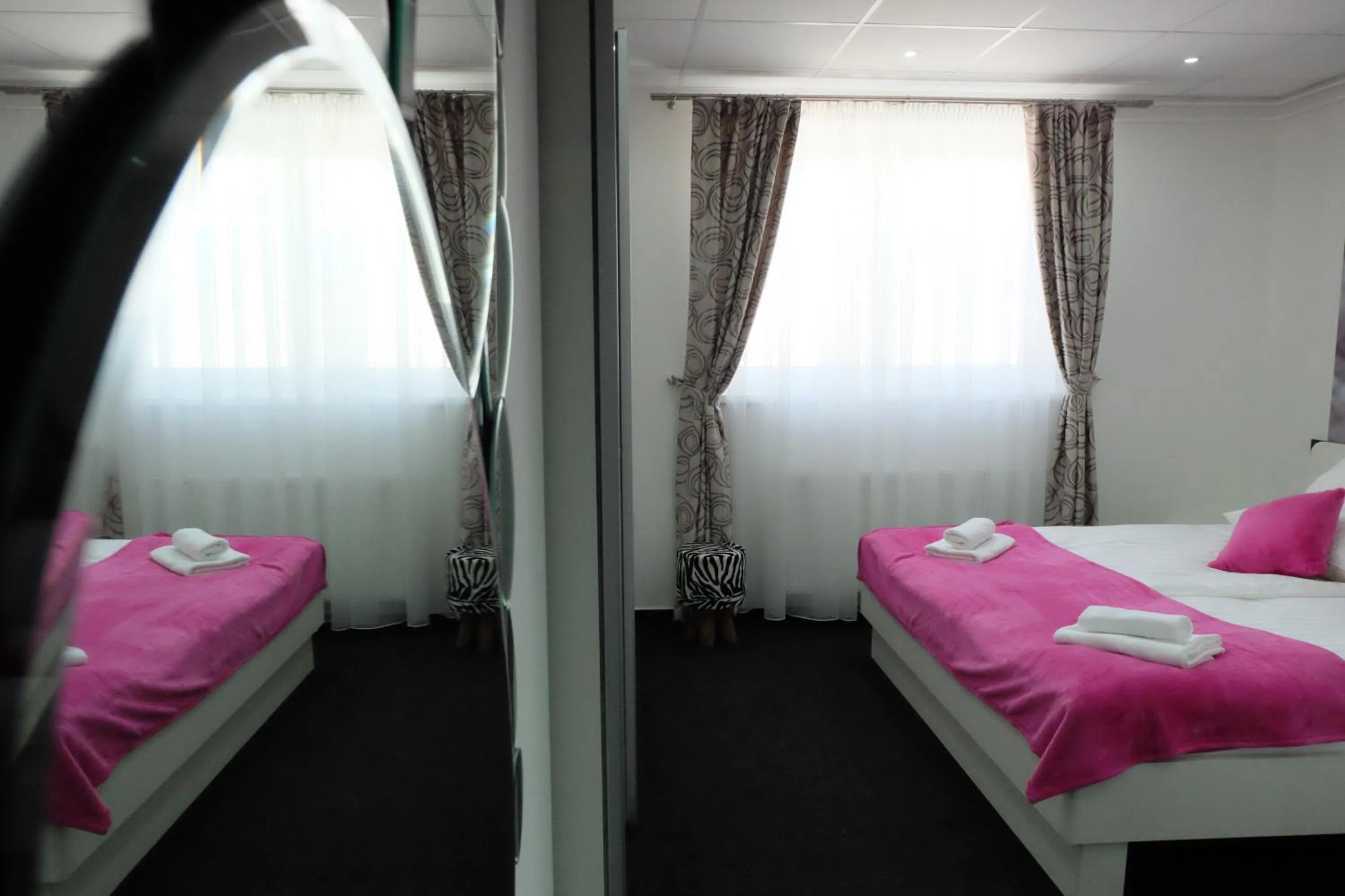 Bed in Luwiana Suites